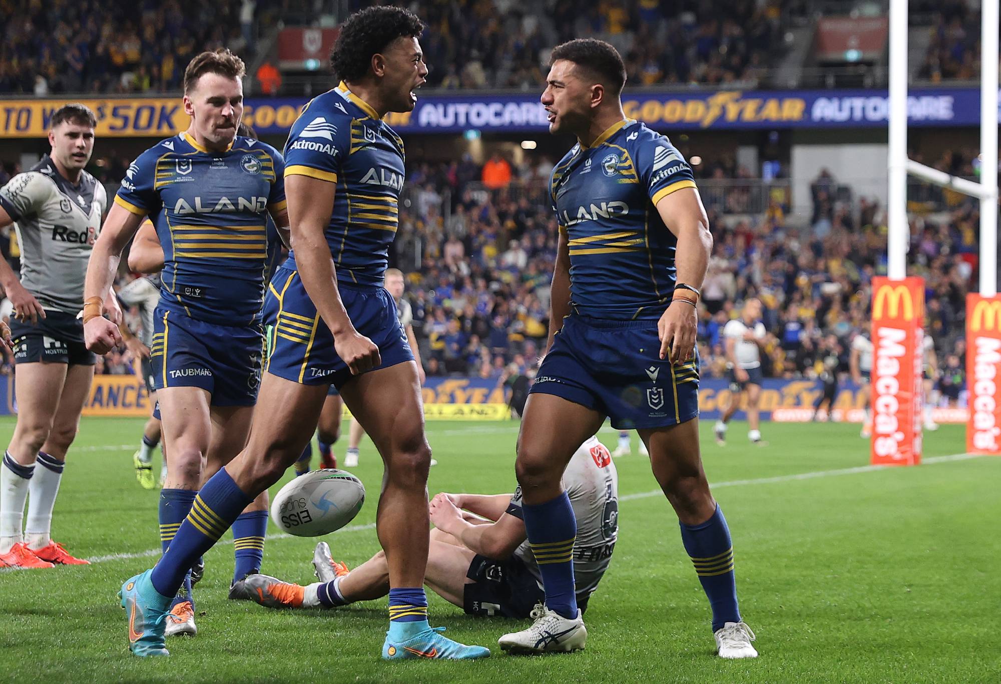 SYDNEY, AUSTRALIA - SEPTEMBER 01: Will Penisini of the Eels celebrates with Waqa Blake of the Eels after scoring a try during the round 25 NRL match between the Parramatta Eels and the Melbourne Storm at CommBank Stadium on September 01, 2022, in Sydney, Australia. (Photo by Cameron Spencer/Getty Images)