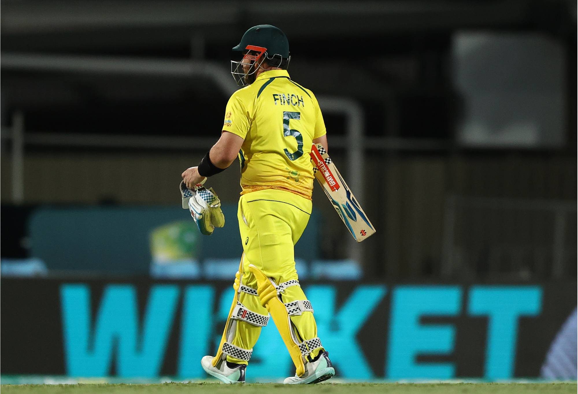 CAIRNS, AUSTRALIA - SEPTEMBER 06: Aaron Finch of Australia walks off after he was dismissed during game one of the One Day International Series between Australia and New Zealand at Cazaly's Stadium on September 06, 2022 in Cairns, Australia. (Photo by Robert Cianflone/Getty Images)