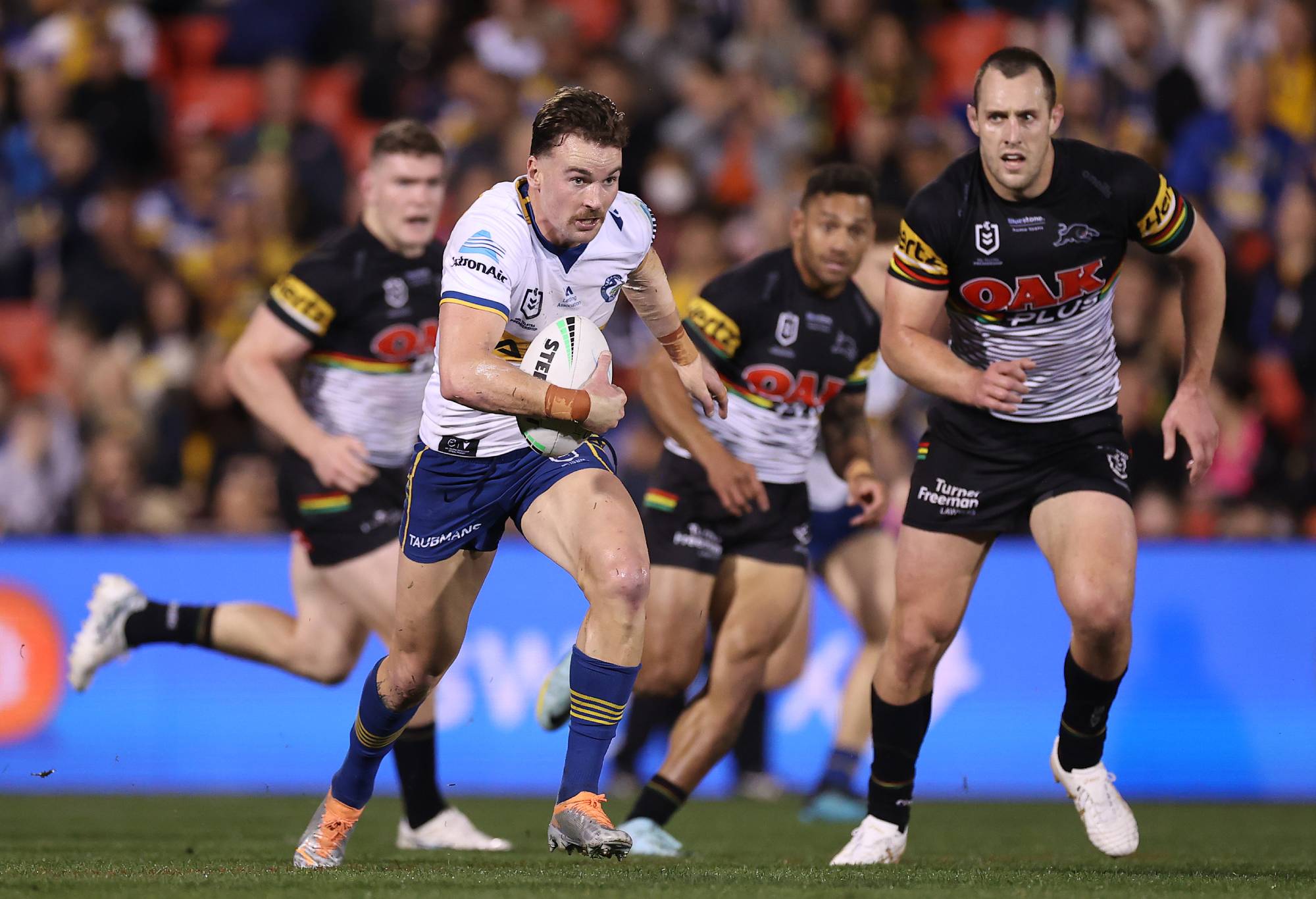 PENRITH, AUSTRALIA - SEPTEMBER 09: Clinton Gutherson of the Eels makes a break during the NRL Qualifying Final match between the Penrith Panthers and the Parramatta Eels at BlueBet Stadium on September 09, 2022 in Penrith, Australia. (Photo by Mark Kolbe/Getty Images)