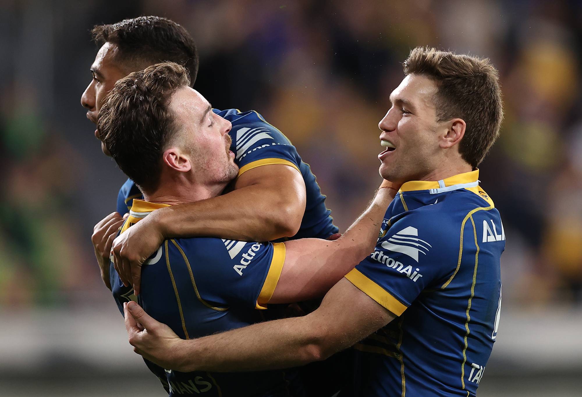SYDNEY, AUSTRALIA - SEPTEMBER 16: Clinton Gutherson of the Eels celebrates with team mates after scoring a try, which was then disallowed by the video bunker during the NRL Semi Final match between the Parramatta Eels and the Canberra Raiders at CommBank Stadium on September 16, 2022 in Sydney, Australia. (Photo by Cameron Spencer/Getty Images)