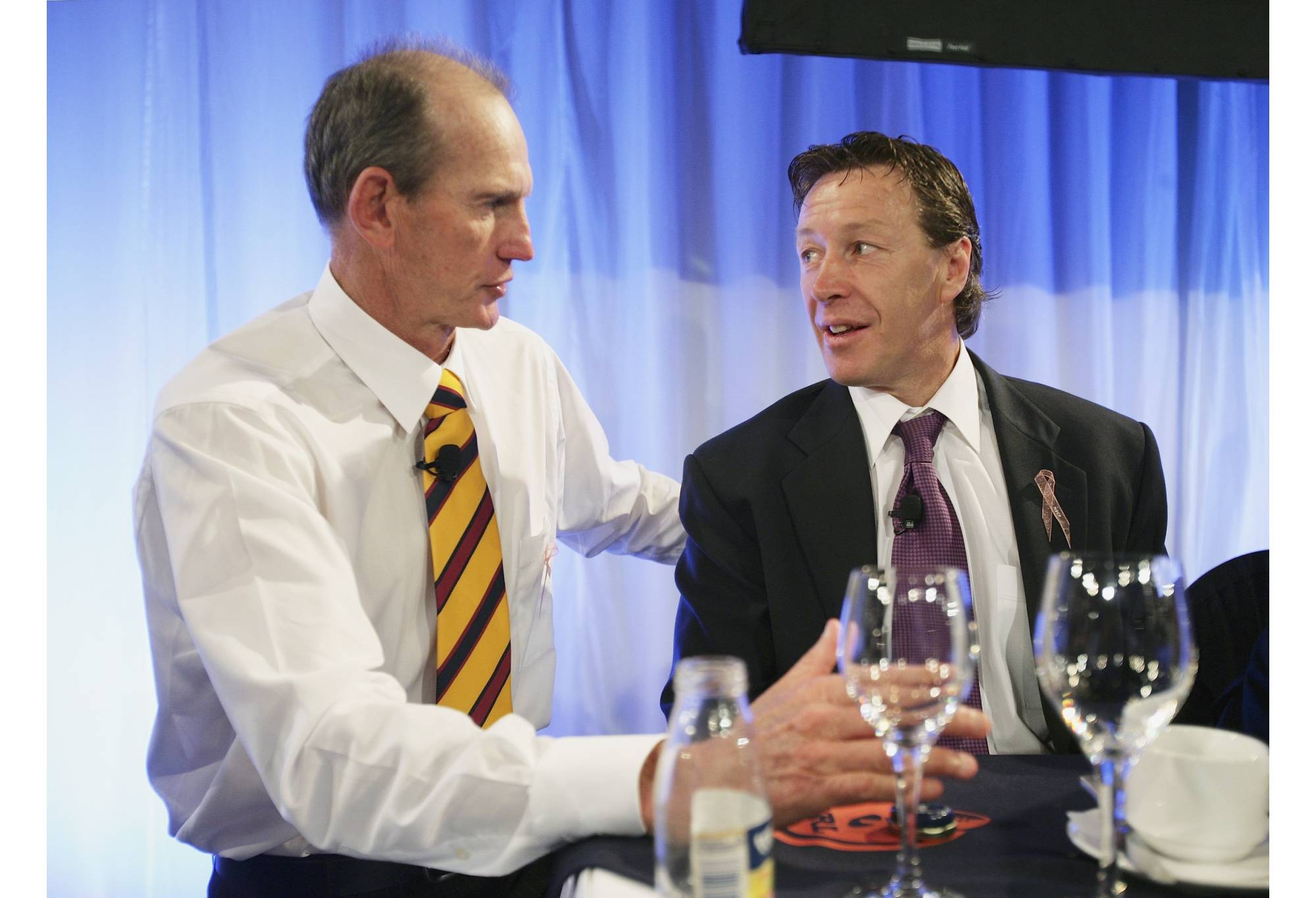 SYDNEY, AUSTRALIA - SEPTEMBER 28: Brisbane Broncos Coach Wayne Bennett and Melbourne Storm Coach Craig Bellamy talk to each other during the NRL Captains Grand Final Breakfast at the Westin Hotel September 28, 2006 in Sydney, Australia. (Photo by Cameron Spencer/Getty Images)