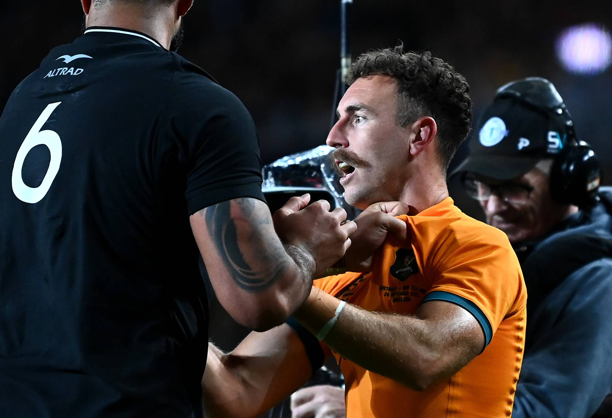 Nic White of the Wallabies scuffles with Akira Ioane of the All Blacks during The Rugby Championship and Bledisloe Cup match between the New Zealand All Blacks and the Australia Wallabies at Eden Park on September 24, 2022 in Auckland, New Zealand. (Photo by Hannah Peters/Getty Images)