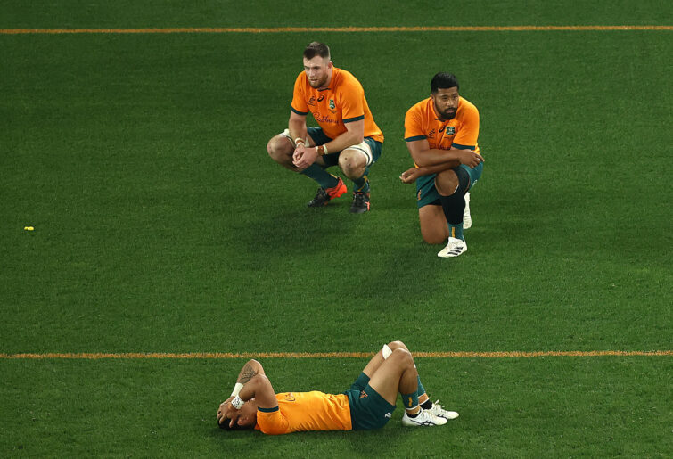 Wallabies players react to losing to the All Blacks.