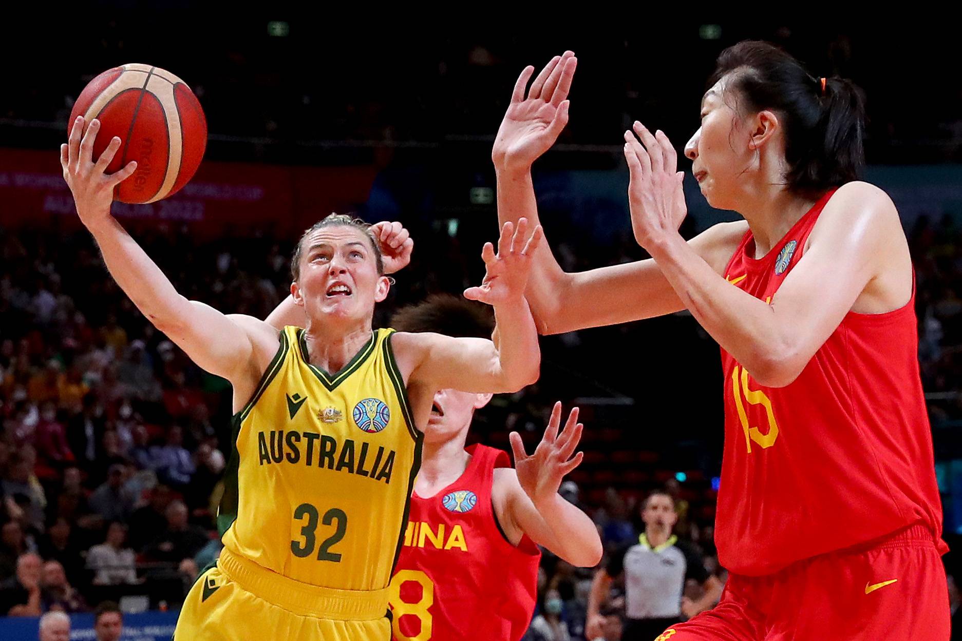 SYDNEY, AUSTRALIA - SEPTEMBER 30: Xu Han of China blocks Samantha Whitcomb of Australia during the 2022 FIBA Women's Basketball World Cup Semi Final match between Australia and China at Sydney Superdome, on September 30, 2022, in Sydney, Australia. (Photo by Kelly Defina/Getty Images)