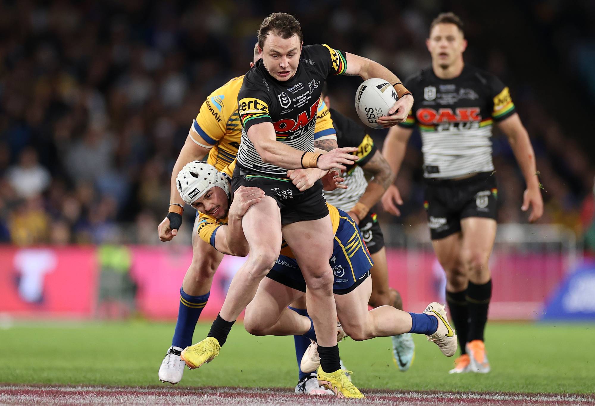 SYDNEY, AUSTRALIA - OCTOBER 02: Dylan Edwards of the Panthers makes a break during the 2022 NRL Grand Final match between the Penrith Panthers and the Parramatta Eels at Accor Stadium on October 02, 2022, in Sydney, Australia. (Photo by Cameron Spencer/Getty Images)