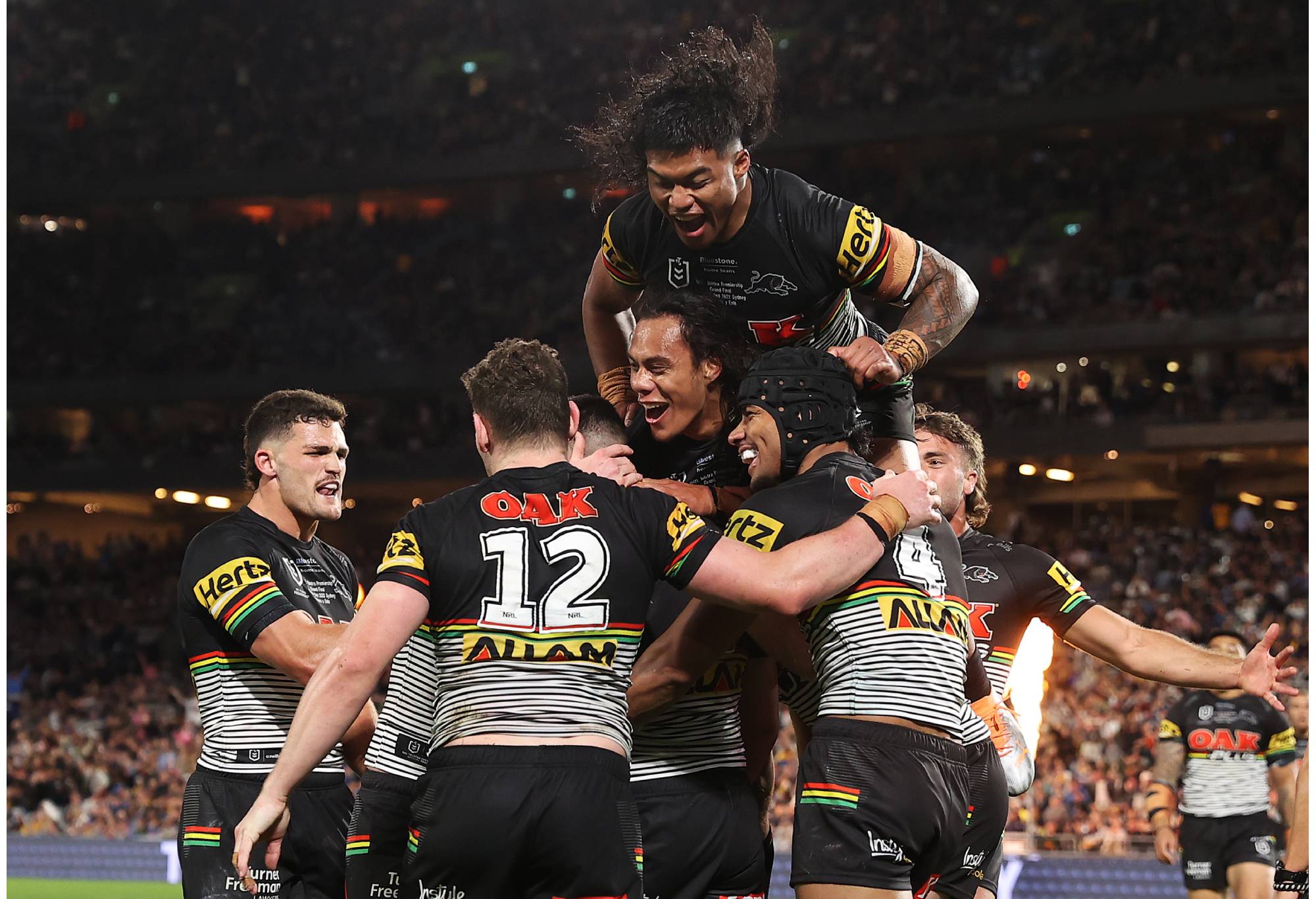 SYDNEY, AUSTRALIA - OCTOBER 02: Charlie Staines of the Panthers celebrates with team mates after scoring a try during the 2022 NRL Grand Final match between the Penrith Panthers and the Parramatta Eels at Accor Stadium on October 02, 2022, in Sydney, Australia. (Photo by Mark Kolbe/Getty Images)