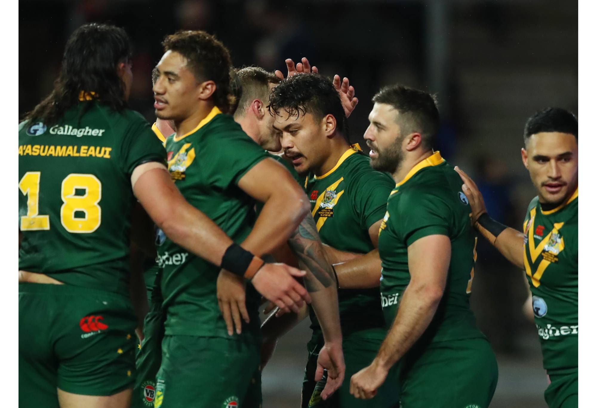 LEEDS, ENGLAND - OCTOBER 15: Jeremiah Nanai of Australia celebrates with teammates after scoring their sides first try during the Rugby League World Cup 2021 Pool B match between Australia and Fiji at Headingley on October 15, 2022 in Leeds, England. (Photo by Jan Kruger/Getty Images for RLWC)