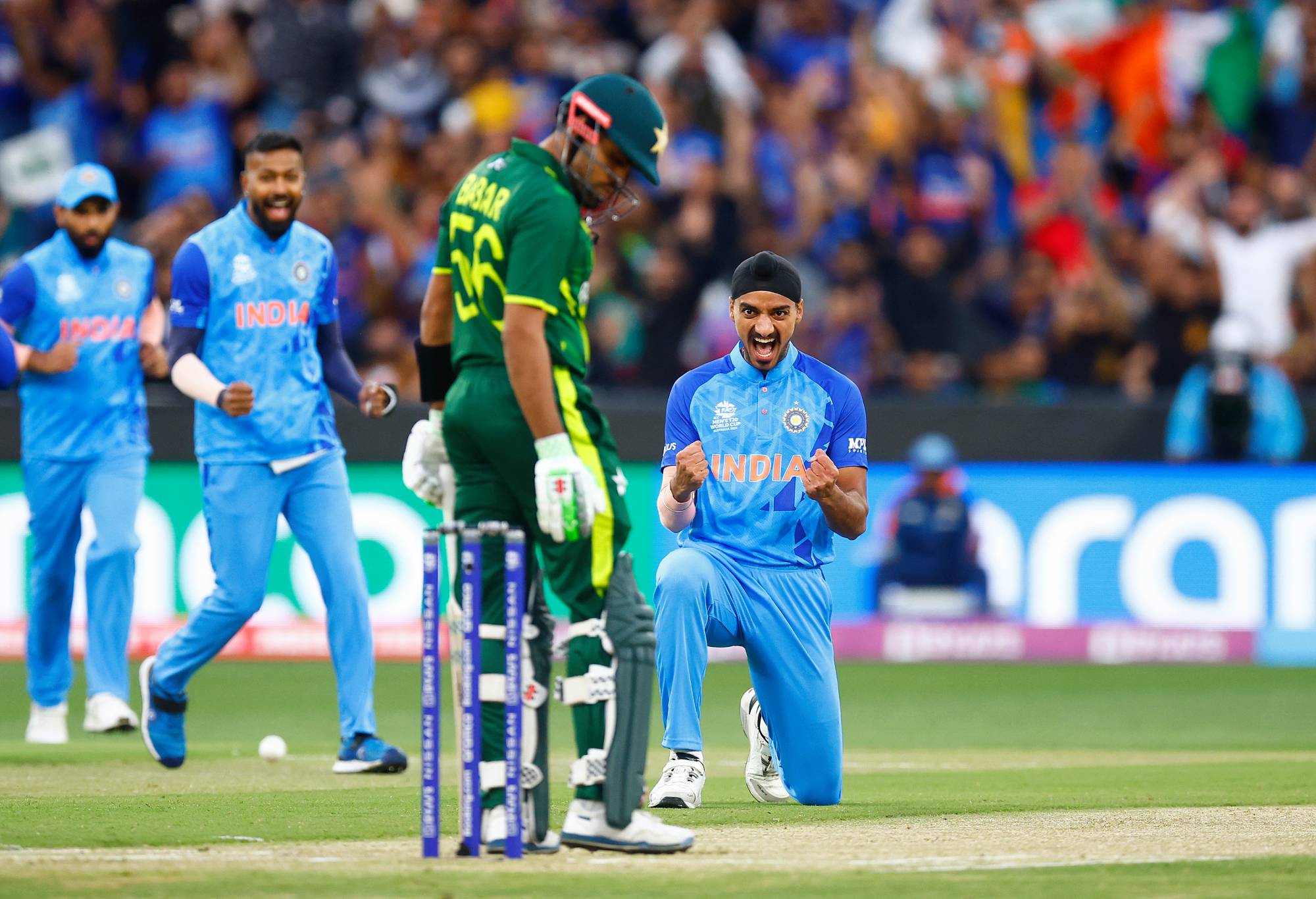 MELBOURNE, AUSTRALIA - OCTOBER 23: Arshdeep Singh of India celebrates the wicket of Babar Azam of Pakistan during the ICC Men's T20 World Cup match between India and Pakistan at Melbourne Cricket Ground on October 23, 2022 in Melbourne, Australia. (Photo by Daniel Pockett-ICC/ICC via Getty Images)