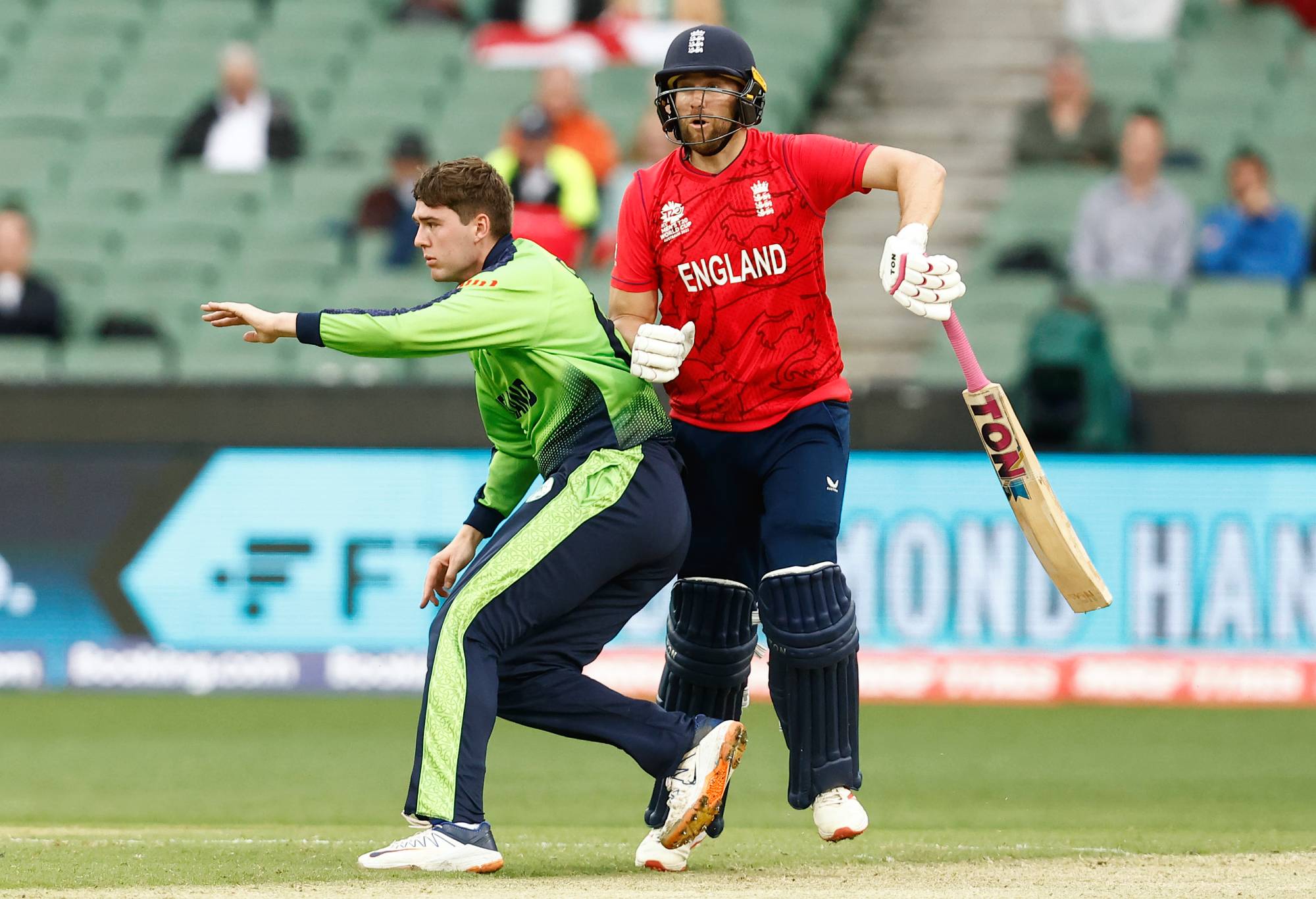 MELBOURNE, AUSTRALIA - OCTOBER 26: Gareth Delany of Ireland and Dawid Malan of England collide during the ICC Men's T20 World Cup match between England and Ireland at Melbourne Cricket Ground on October 26, 2022 in Melbourne, Australia. (Photo by Darrian Traynor/Getty Images)