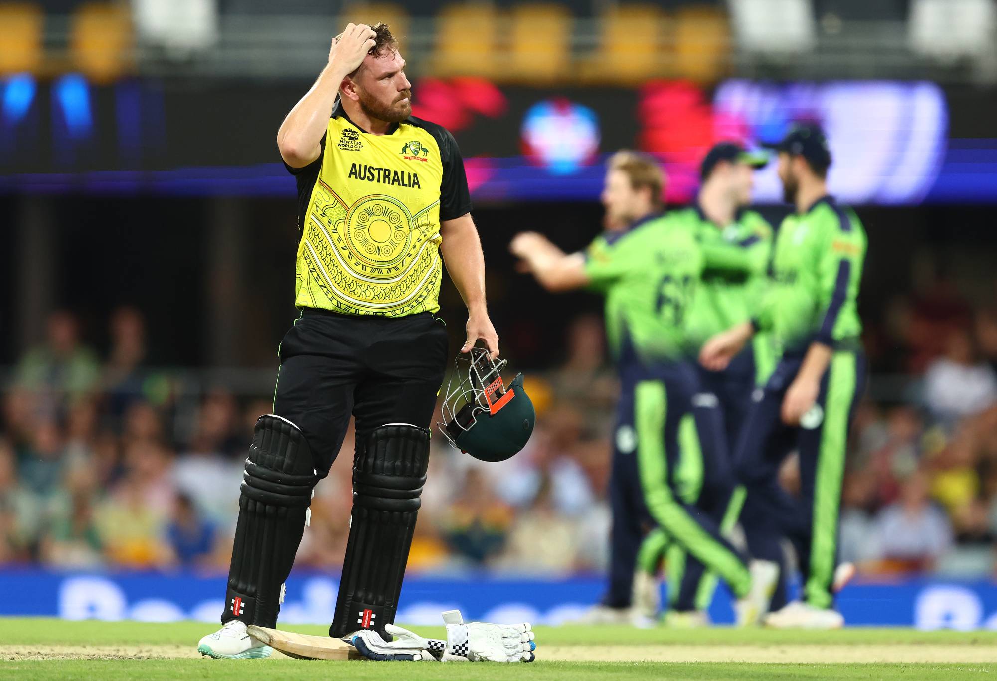 BRISBANE, AUSTRALIA - OCTOBER 31: Aaron Finch of Australia reacts after the wicket of Mitchell Marsh of Australia during the ICC Men's T20 World Cup match between Australia and Ireland at The Gabba on October 31, 2022 in Brisbane, Australia. (Photo by Chris Hyde-ICC/ICC via Getty Images)