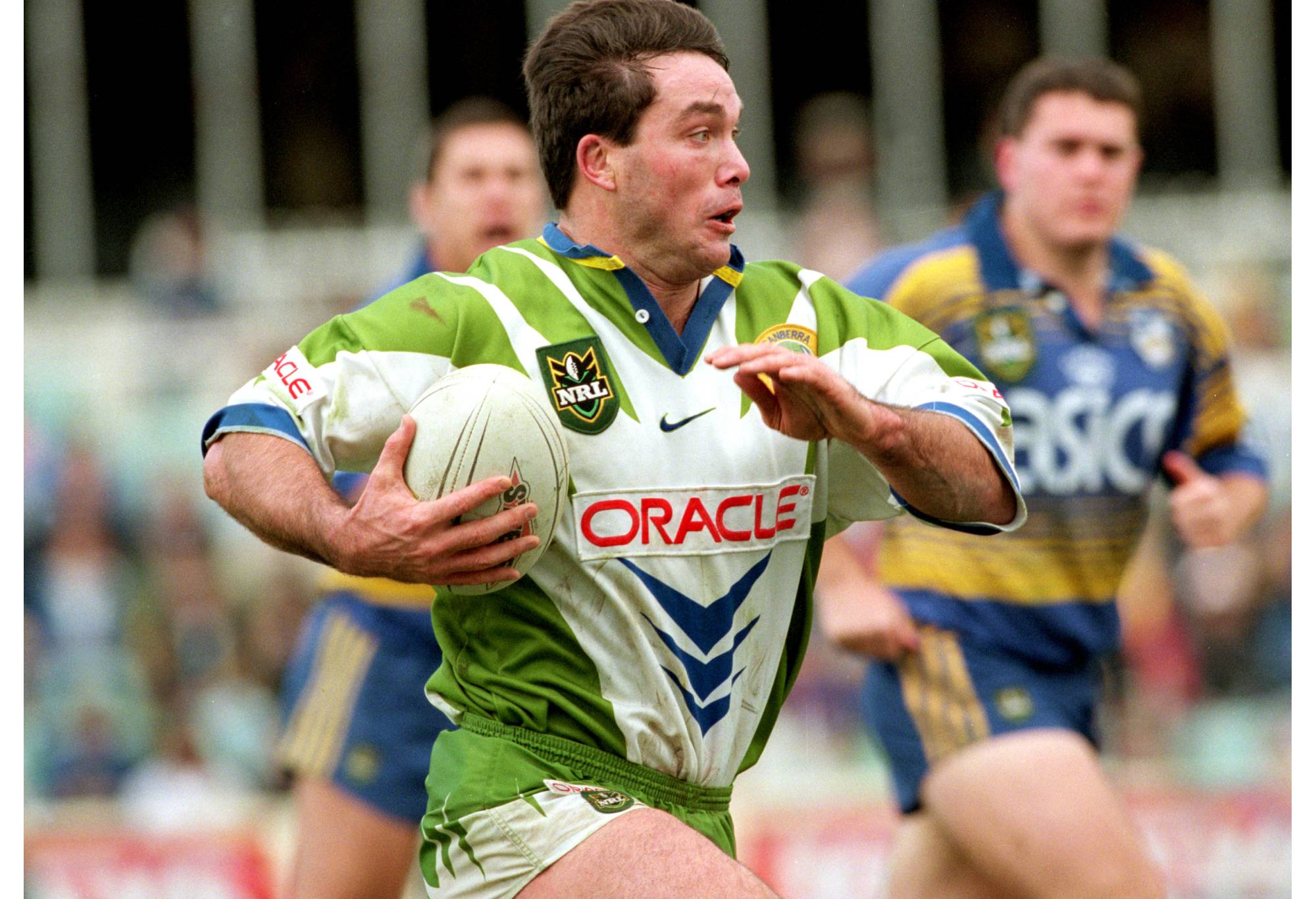 SYDNEY, AUSTRALIA - 1998:  Bradley Clyde of the Raiders makes a break during a NRL match between the Parramatta Eels and the Canberra Raiders at Parramatta Stadium 1998, in Sydney, Australia. (Photo by Adam Pretty/Getty Images)