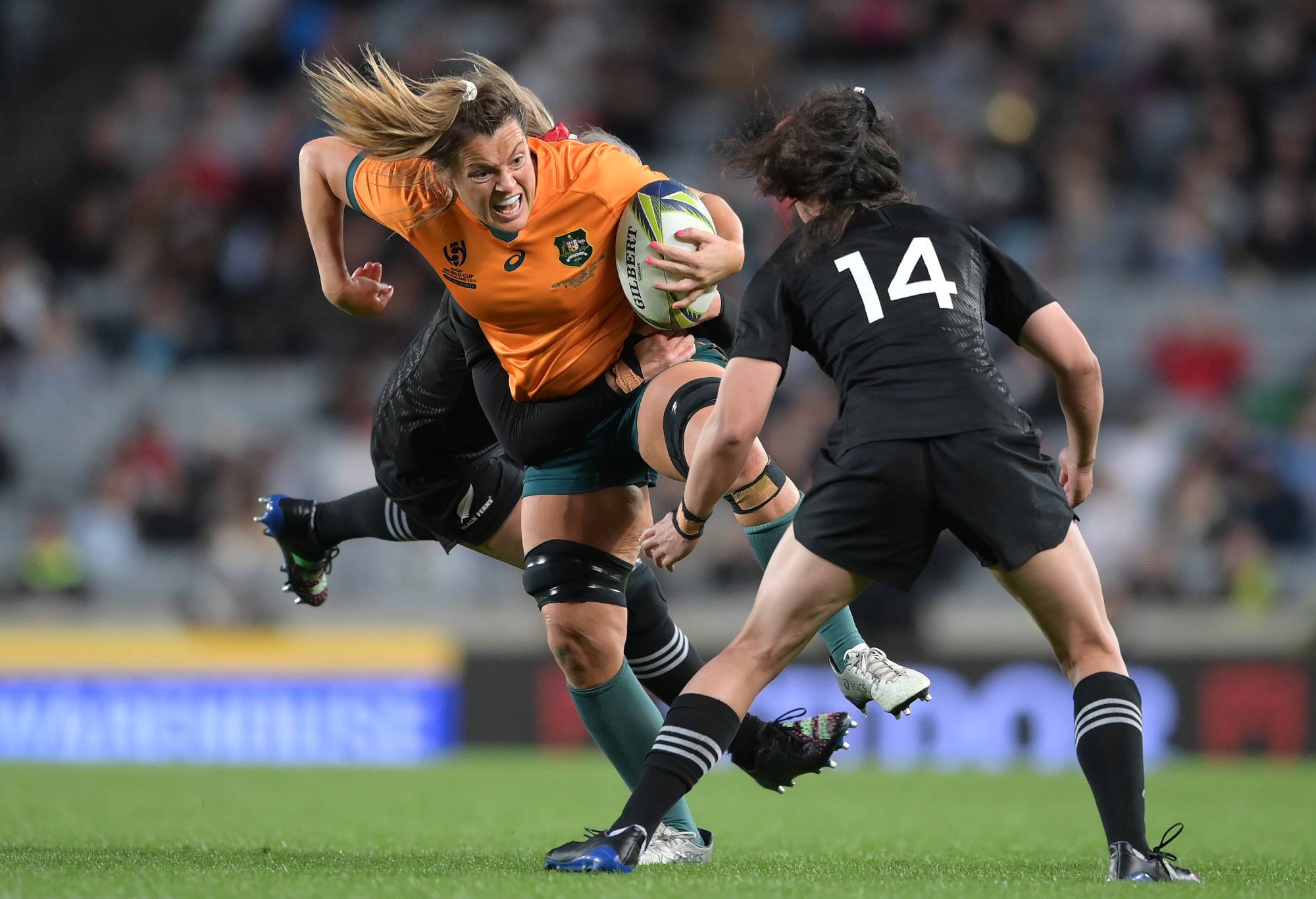 Grace Hamilton of Australia is tackled during the Pool A Rugby World Cup 2021 New Zealand match between Australia and New Zealand at Eden Park on October 08, 2022, in Auckland, New Zealand. (Photo by Hannah Peters - World Rugby/World Rugby via Getty Images)