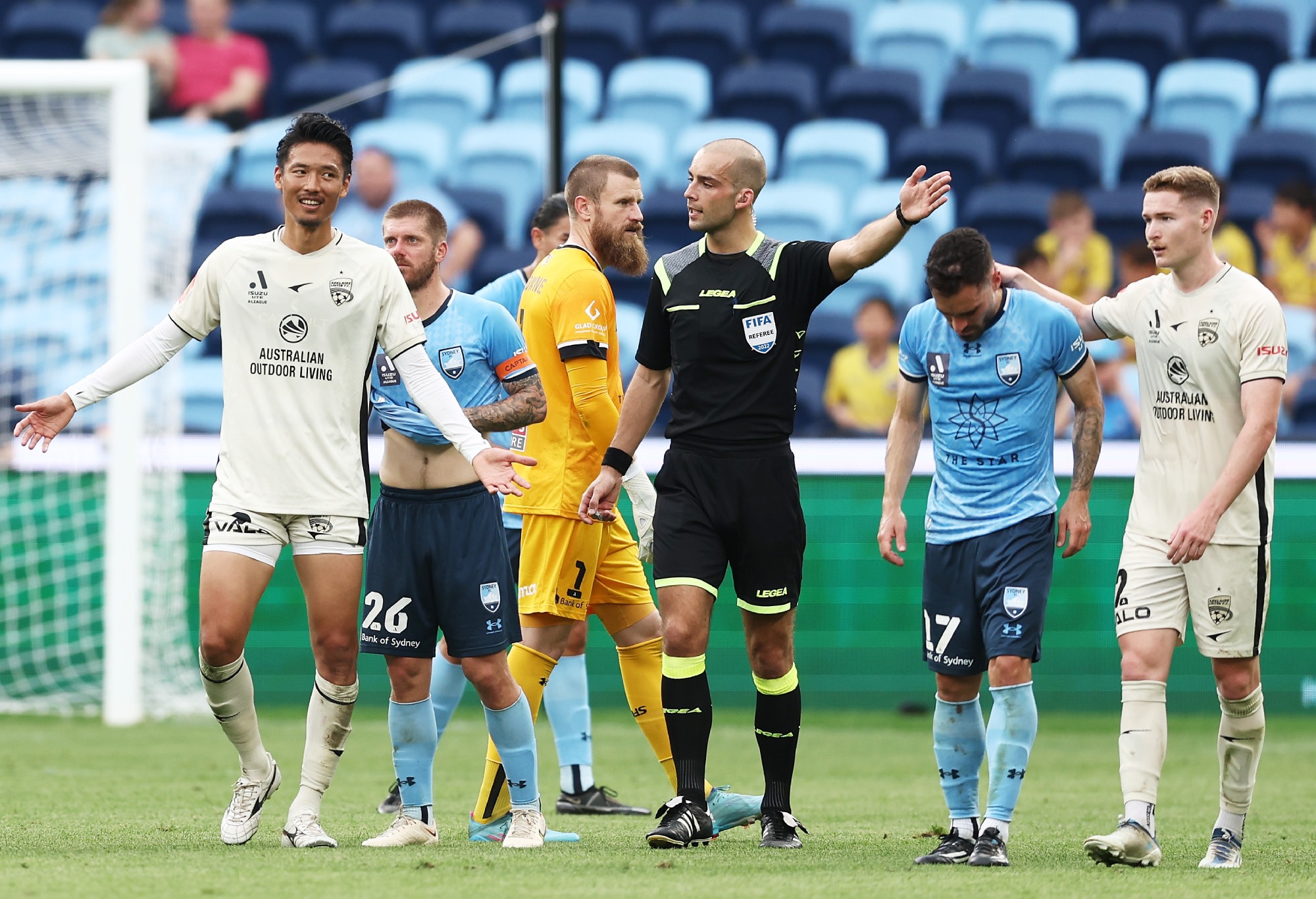 Hiroshi Ibusuki of United is given a red card by referee Daniel Elder during the round three A-League Men's match between Sydney FC and Adelaide United at Allianz Stadium, on October 23, 2022, in Sydney, Australia. (Photo by Matt King/Getty Images)