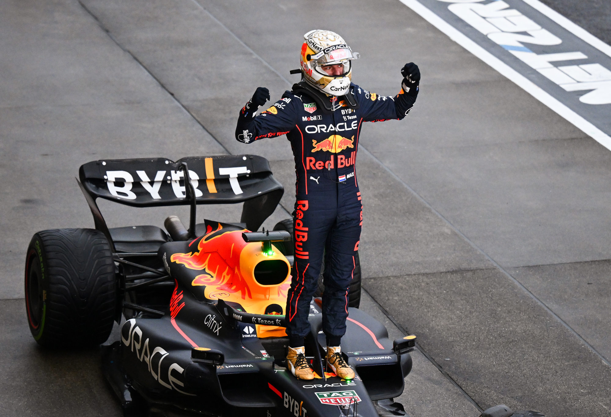 Max Verstappen celebrates winning the Japan Grand Prix.