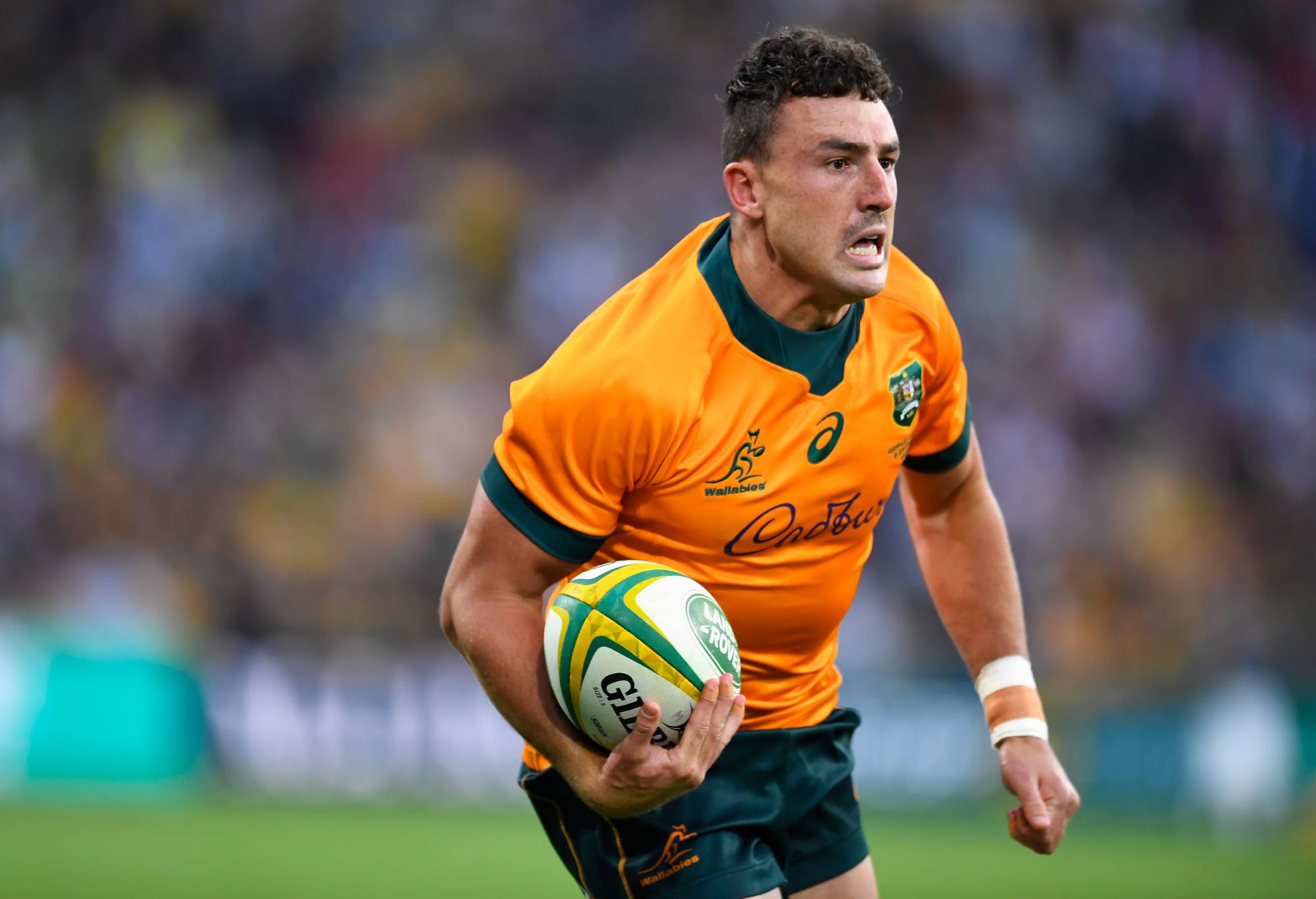 Tom Banks of the Wallabies runs the ball during The Rugby Championship match between the Australian Wallabies and the South Africa Springboks at Suncorp Stadium on September 18, 2021 in Brisbane, Australia. (Photo by Albert Perez/Getty Images)