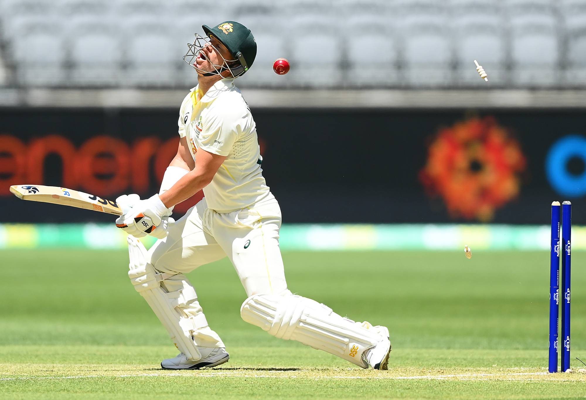 - NOVEMBER 30: David Warner of Australia reacts after being bowled by Jayden Seales of the West Indies during day one of the First Test match between Australia and the West Indies at Optus Stadium on November 30, 2022 in Perth, Australia. (Photo by Quinn Rooney - CA/Cricket Australia via Getty Images)