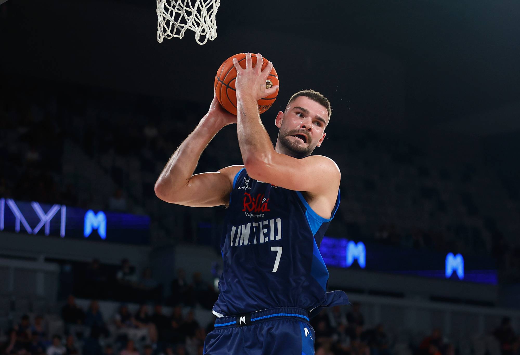 MELBOURNE, AUSTRALIA - OCTOBER 20: Isaac Humphries of United rebounds during the round four NBL match between Melbourne United and Cairns Taipans at John Cain Arena, on October 20, 2022, in Melbourne, Australia. (Photo by Daniel Pockett/Getty Images)