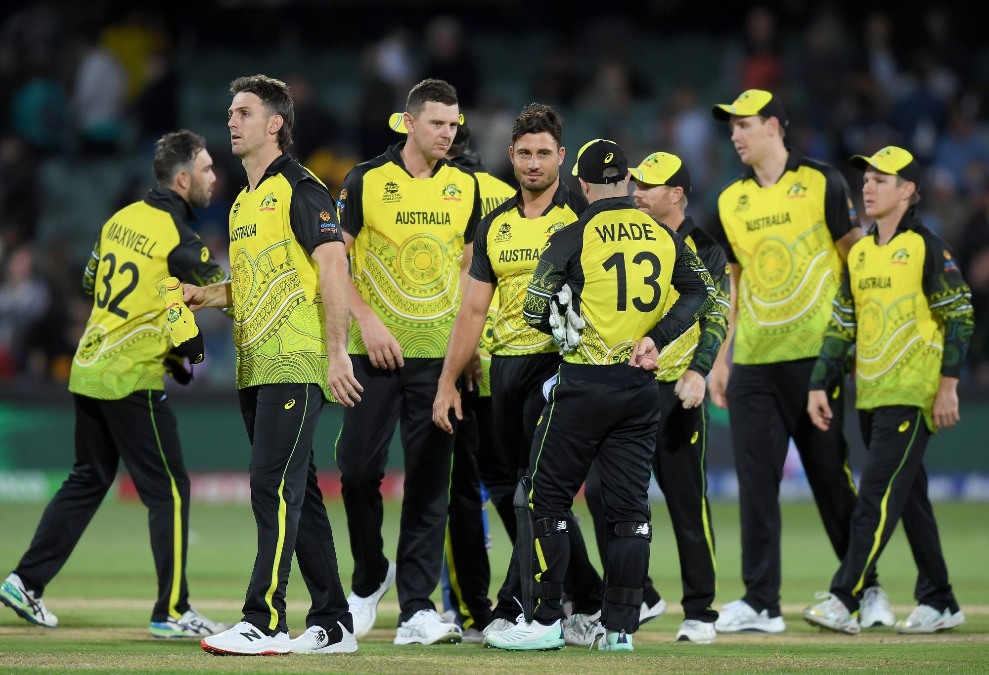 ADELAIDE, AUSTRALIA - NOVEMBER 04: Australian players celebrate victory following the ICC Men's T20 World Cup match between Australia and Afghanistan at Adelaide Oval on November 04, 2022 in Adelaide, Australia. (Photo by Mark Brake-ICC/ICC via Getty Images)