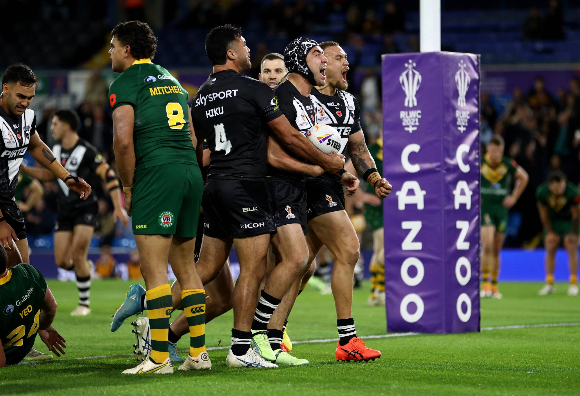 LEEDS, ENGLAND - NOVEMBER 11: Jahrome Hughes of New Zealand celebrates their sides first try during the Rugby League World Cup Semi-Final match between Australia and New Zealand at Elland Road on November 11, 2022 in Leeds, England. (Photo by Michael Steele/Getty Images)