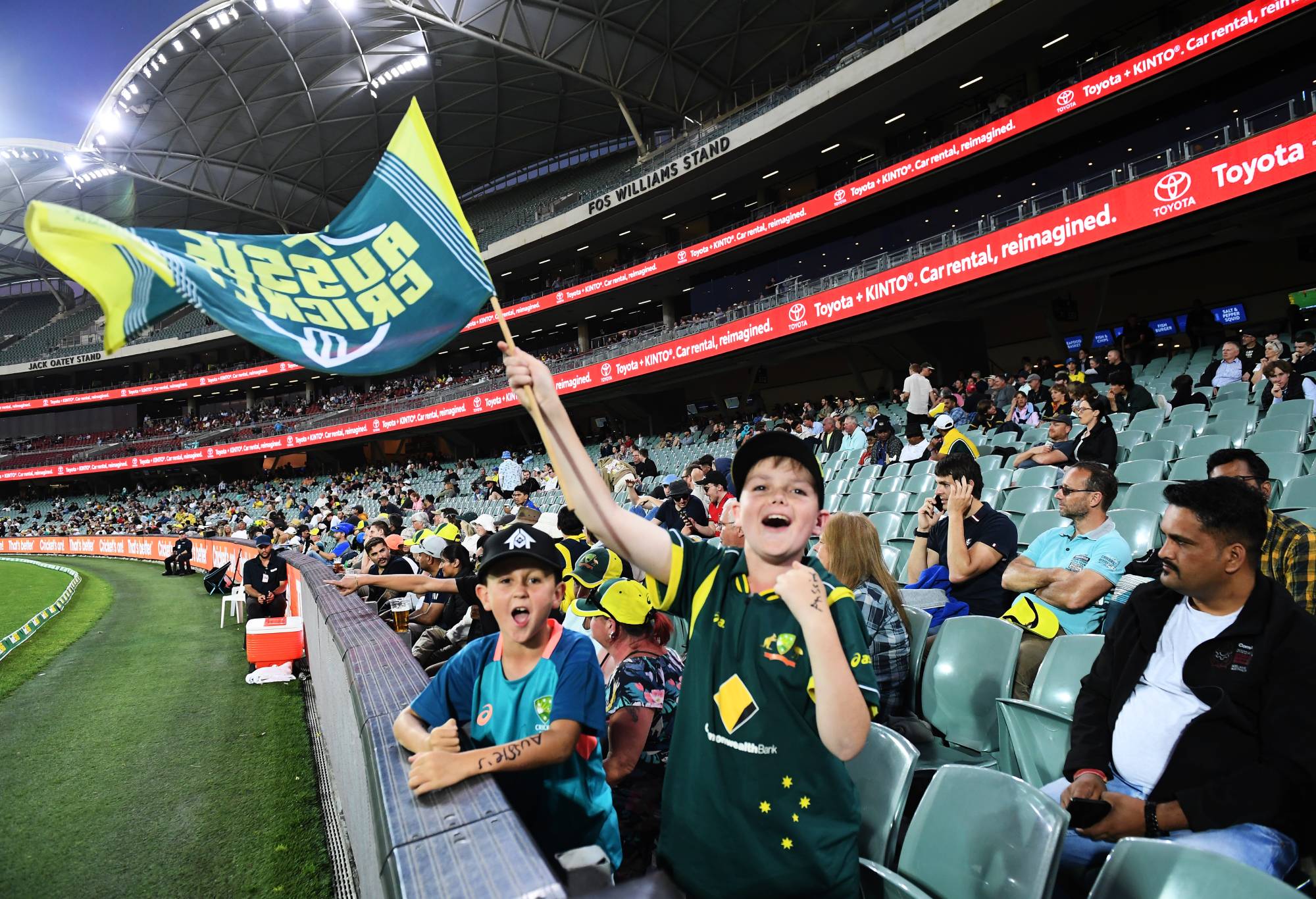A young Aussie supporter waves a flag during game one of the ODI series against England at Adelaide. (Photo by Mark Brake - CA/Cricket Australia via Getty Images)