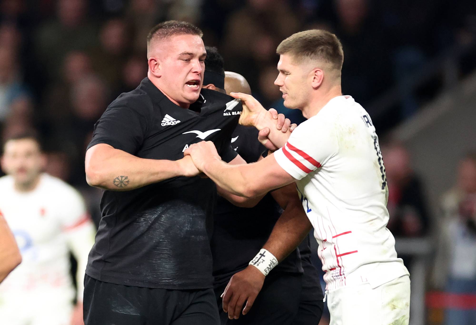 Owen Farrell of England interacts with Ethan de Groot of New Zealand during the Autumn International match between England and New Zealand at Twickenham Stadium on November 19, 2022 in London, England. (Photo by Warren Little/Getty Images)