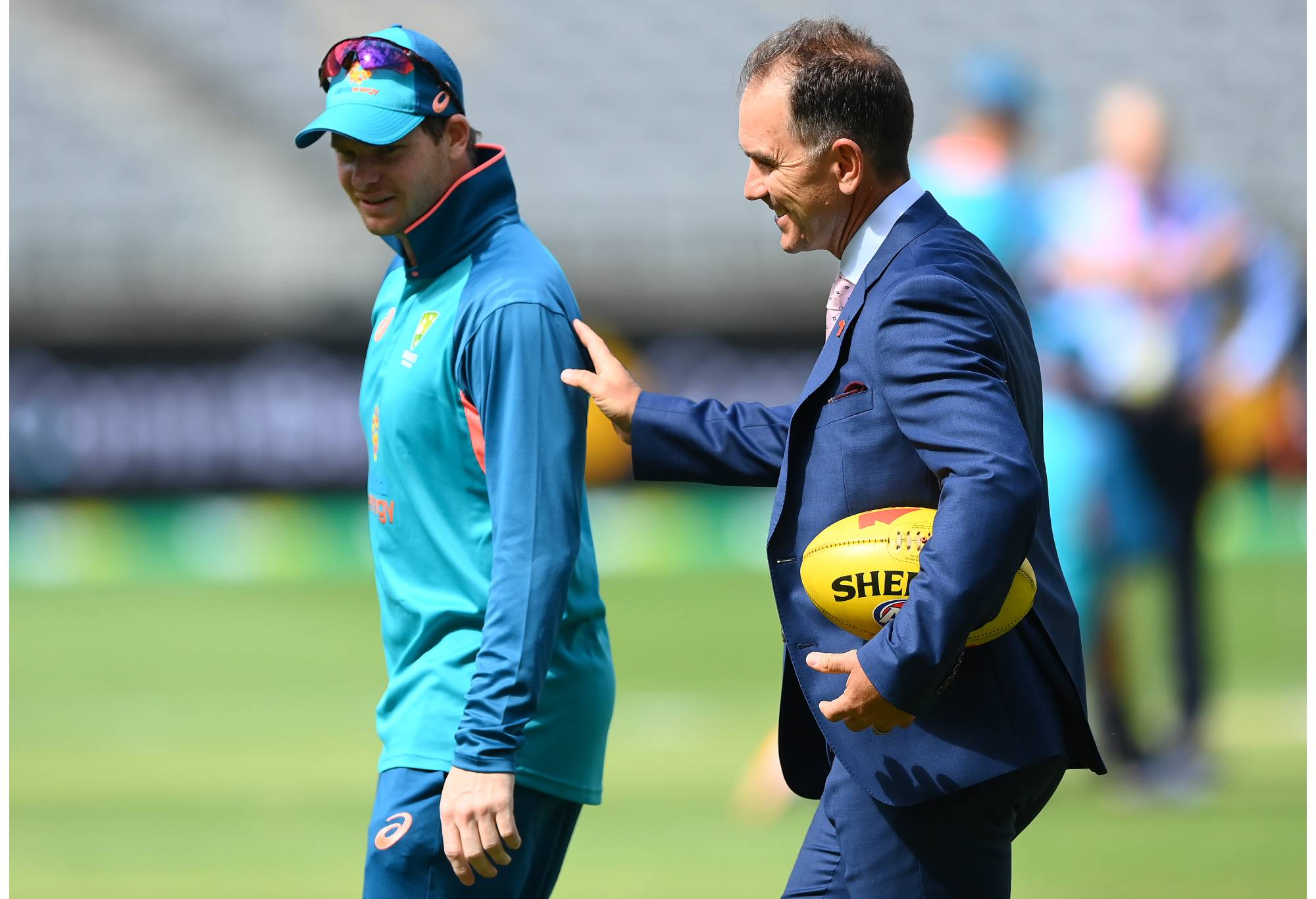 PERTH, AUSTRALIA - NOVEMBER 30: Justin Langer speaks with Steve Smith of Australia during day one of the First Test match between Australia and the West Indies at Optus Stadium on November 30, 2022 in Perth, Australia. (Photo by Quinn Rooney - CA/Cricket Australia via Getty Images)