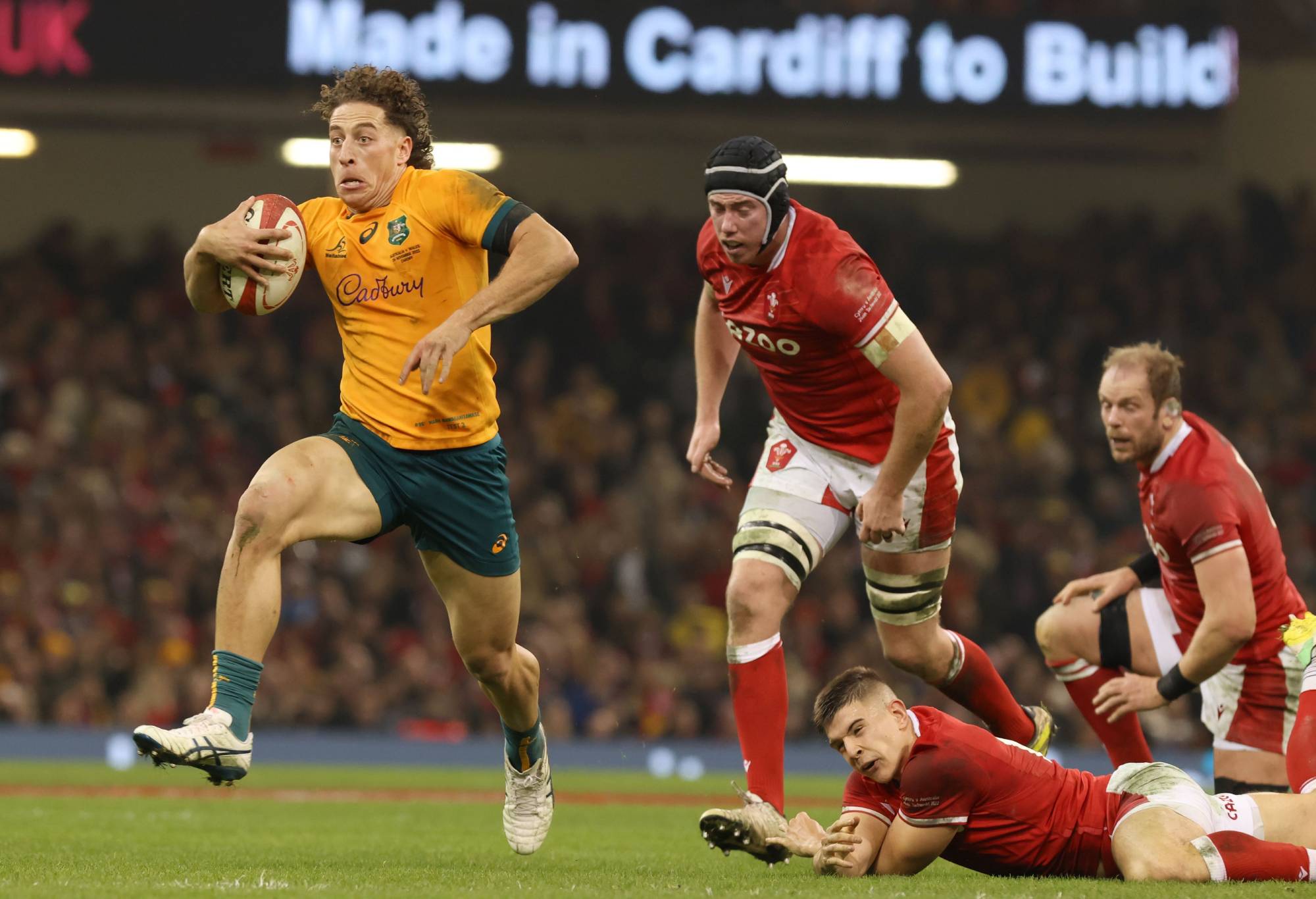 CARDIFF, WALES - NOVEMBER 26: Mark Nawaqanitawase of Australia runs with the ball during the Autumn International match between Wales and Australia at Principality Stadium on November 26, 2022 in Cardiff, Wales. (Photo by Huw Fairclough/Getty Images)