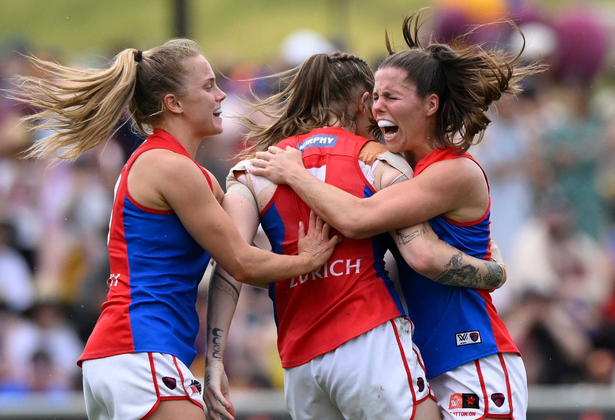 Tayla Harris of the Demons celebrates kicking a goal during the AFLW Grand Final.