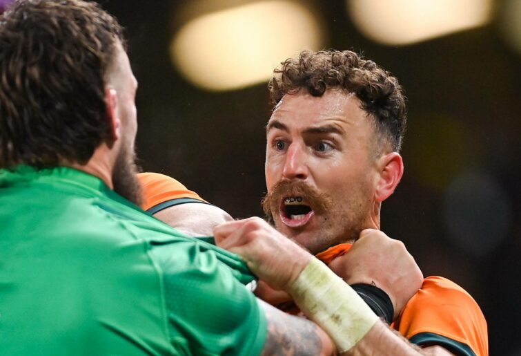 Nic White of Australia tussles with Andrew Porter of Ireland during the Bank of Ireland Nations Series match between Ireland and Australia at the Aviva Stadium in Dublin. (Photo By Ramsey Cardy/Sportsfile via Getty Images)