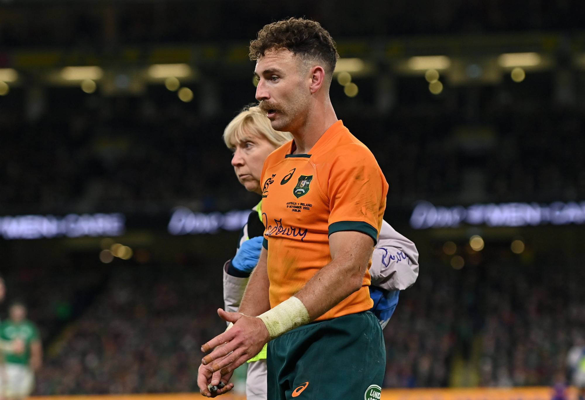 Nic White of Australia leaves the pitch for a leaves the pitch for a head injury assessment during the Bank of Ireland Nations Series match between Ireland and Australia at the Aviva Stadium in Dublin. (Photo By Ramsey Cardy/SportsfilE via Getty Images)