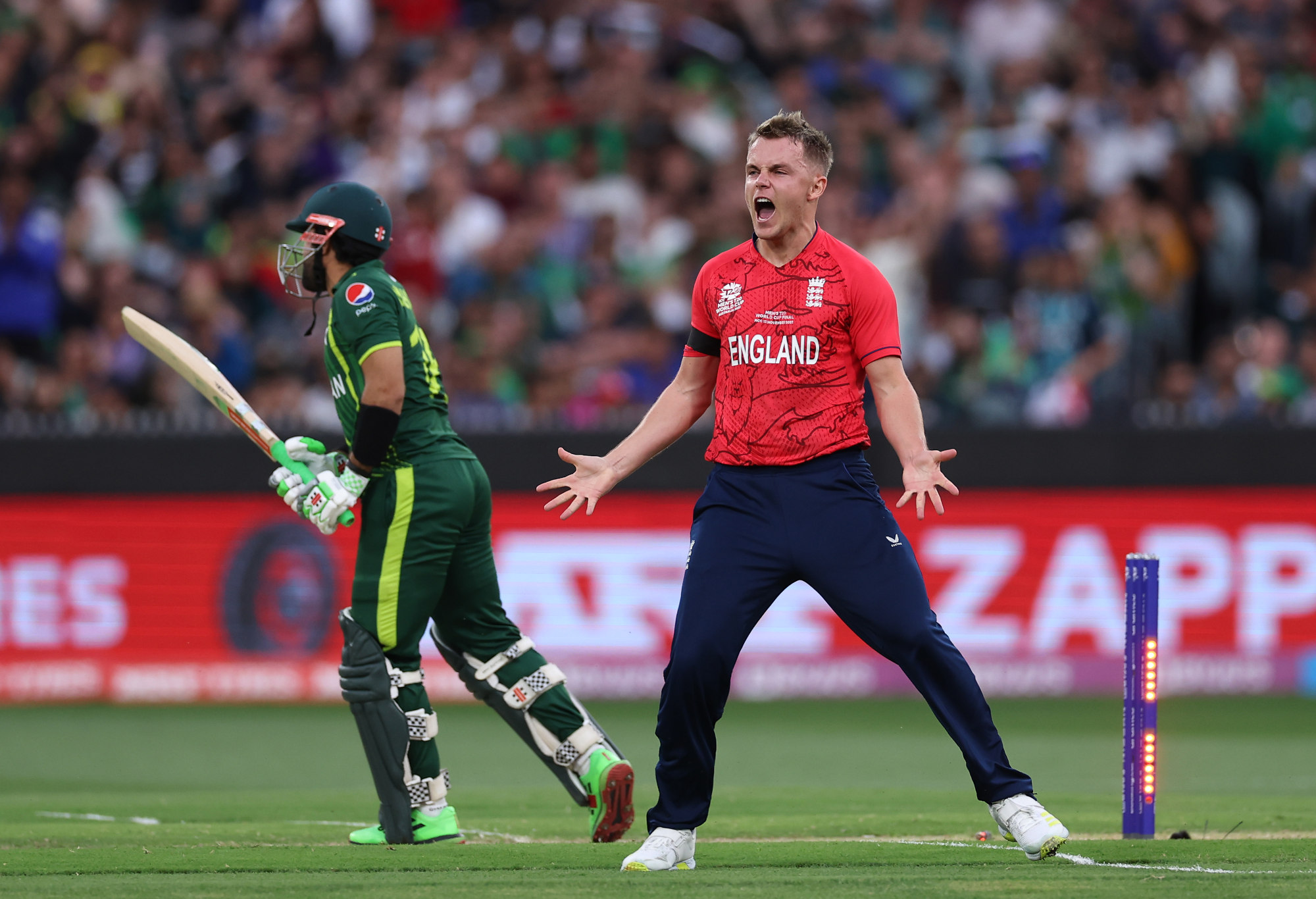 Sam Curran of England celebrates after taking the wicket of Mohammad Rizwan of Pakistan.