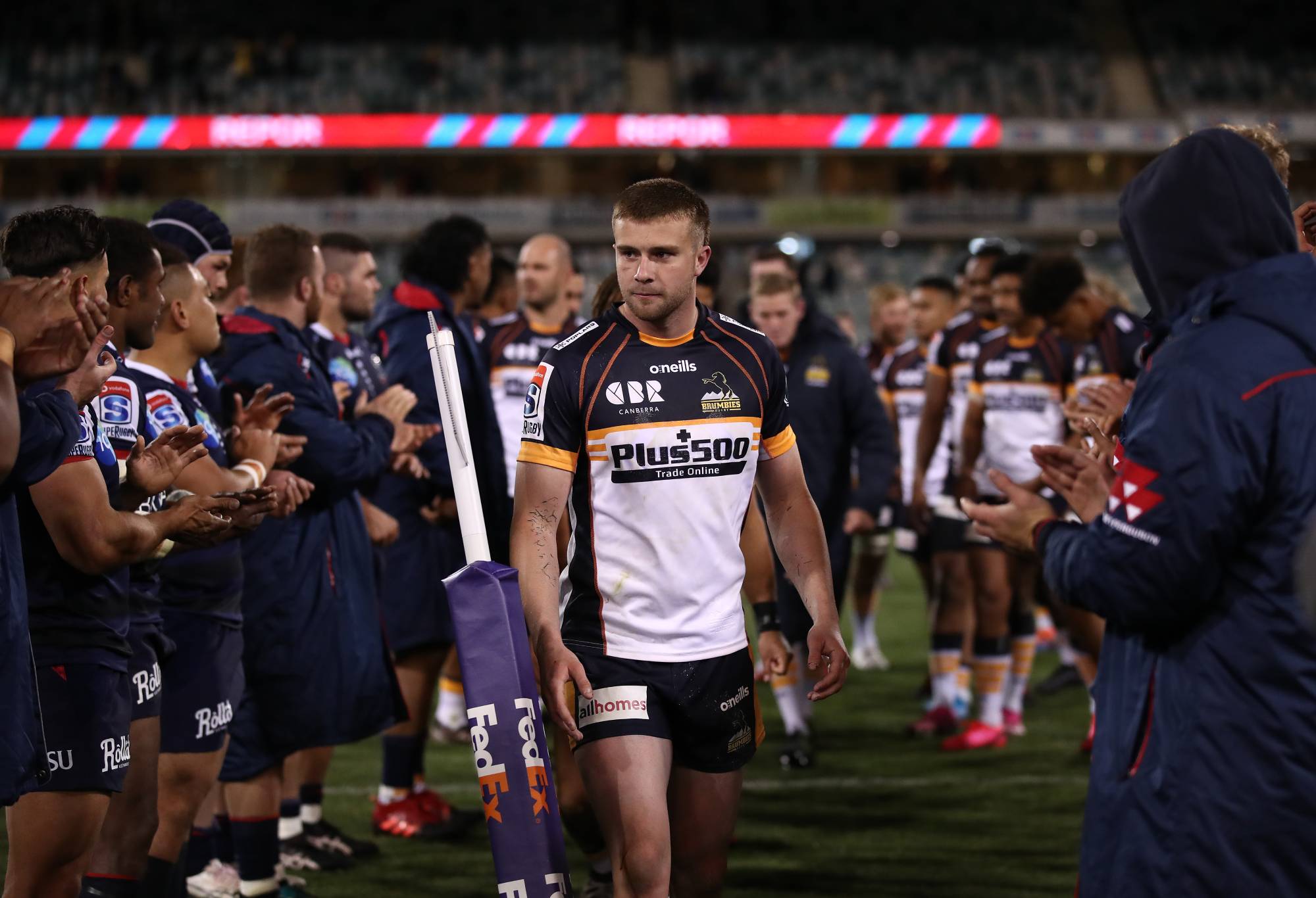 Mack Hansen of the Brumbies and team mates are cheered off after they defeated the Rebels during the round one Super Rugby AU match between the Brumbies and the Rebels at GIO Stadium on July 04, 2020 in Canberra, Australia. (Photo by Cameron Spencer/Getty Images)