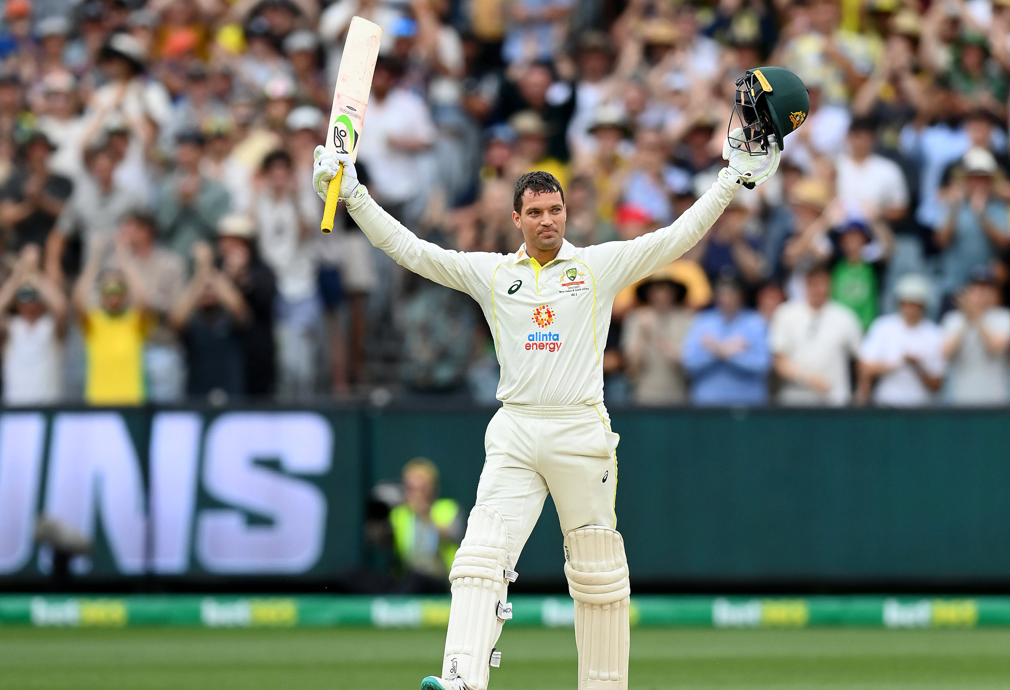 Australia's Alex Carey celebrates his century.