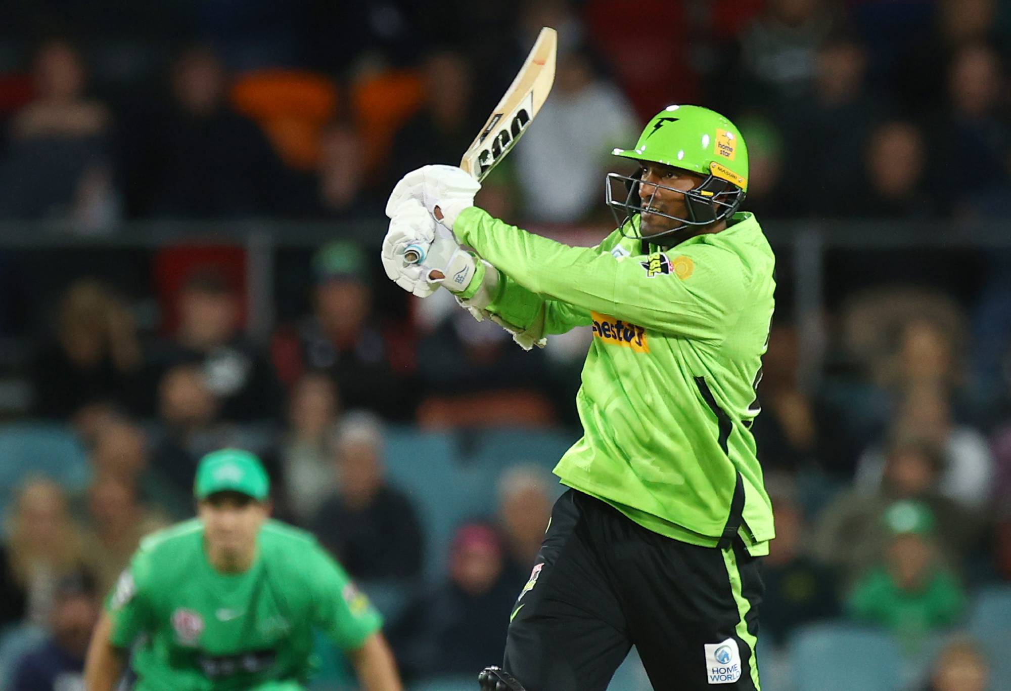 CANBERRA, AUSTRALIA - DECEMBER 13: Gurinder Sandhu of the Thunder bats during the Men's Big Bash League match between the Sydney Thunder and the Melbourne Stars at Manuka Oval, on December 13, 2022, in Canberra, Australia. (Photo by Mark Nolan/Getty Images)