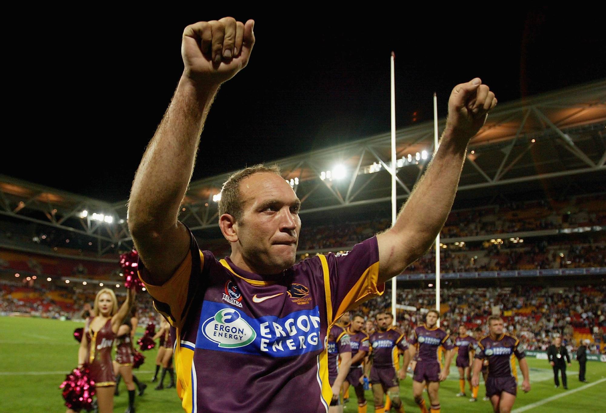 BRISBANE, AUSTRALIA - SEPTEMBER 11: Gorden Tallis of the Broncos waves to the crowd after his final match during the NRL match between the Brisbane Broncos and Melbourne Storm at Suncorp Stadium, on September 11, 2004 in Brisbane, Australia. (Photo by Jonathan Wood/Getty Images)
