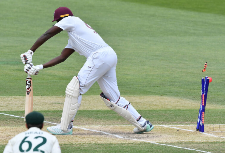 Jason Holder of West Indies is bowled.