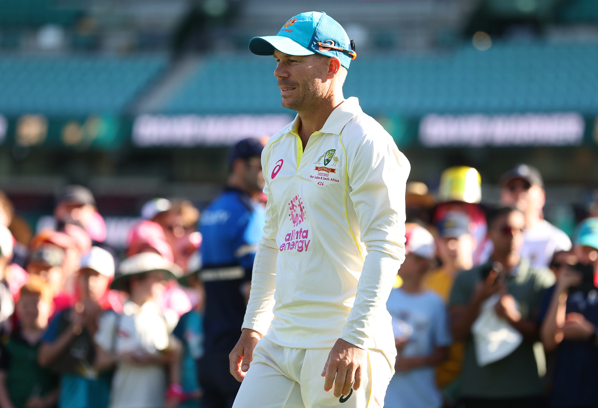 David Warner of Australia walks to the podium after being named Player of the Series against South Africa.