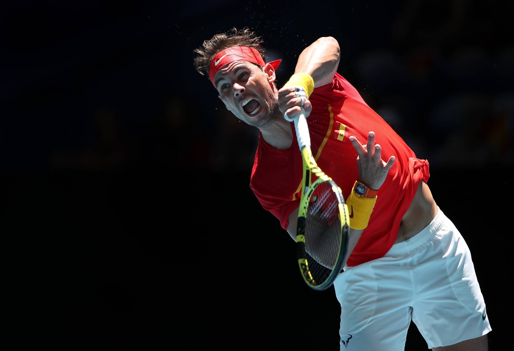 PERTH, AUSTRALIA - JANUARY 08: Rafael Nadal of Team Spain serves to Yoshihito Nishioka of Team Japan during day six of the 2020 ATP Cup Group Stage at RAC Arena on January 08, 2020 in Perth, Australia. (Photo by Paul Kane/Getty Images)
