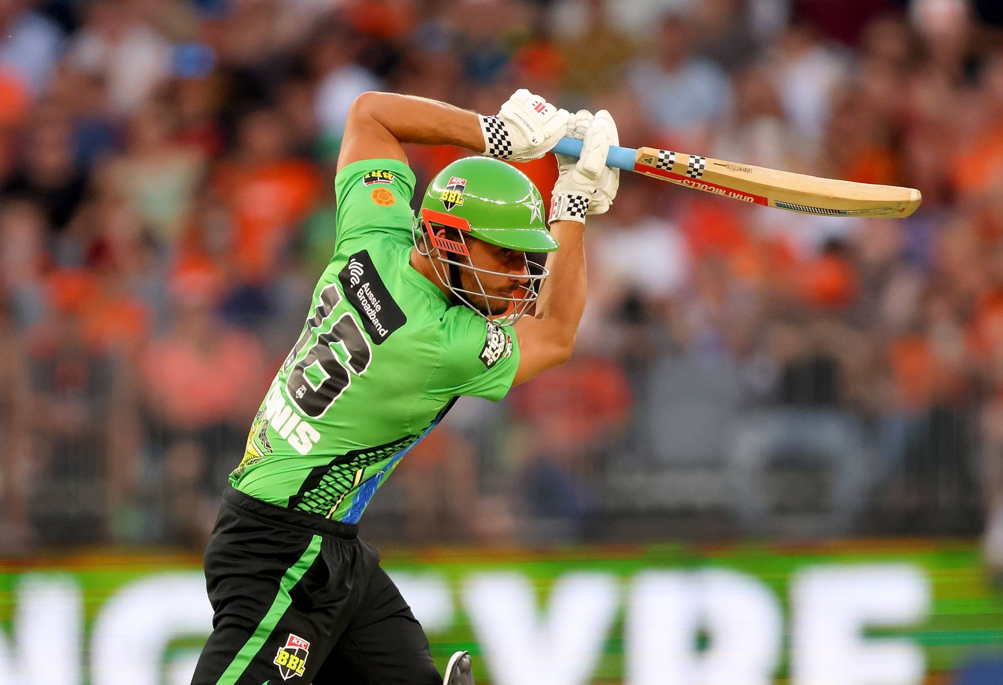 PERTH, AUSTRALIA - DECEMBER 29: Marcus Stoinis of the Stars plays a cut shot across the ground during the Men's Big Bash League match between the Perth Scorchers and the Melbourne Stars at Optus Stadium, on December 29, 2022, in Perth, Australia. (Photo by James Worsfold/Getty Images)