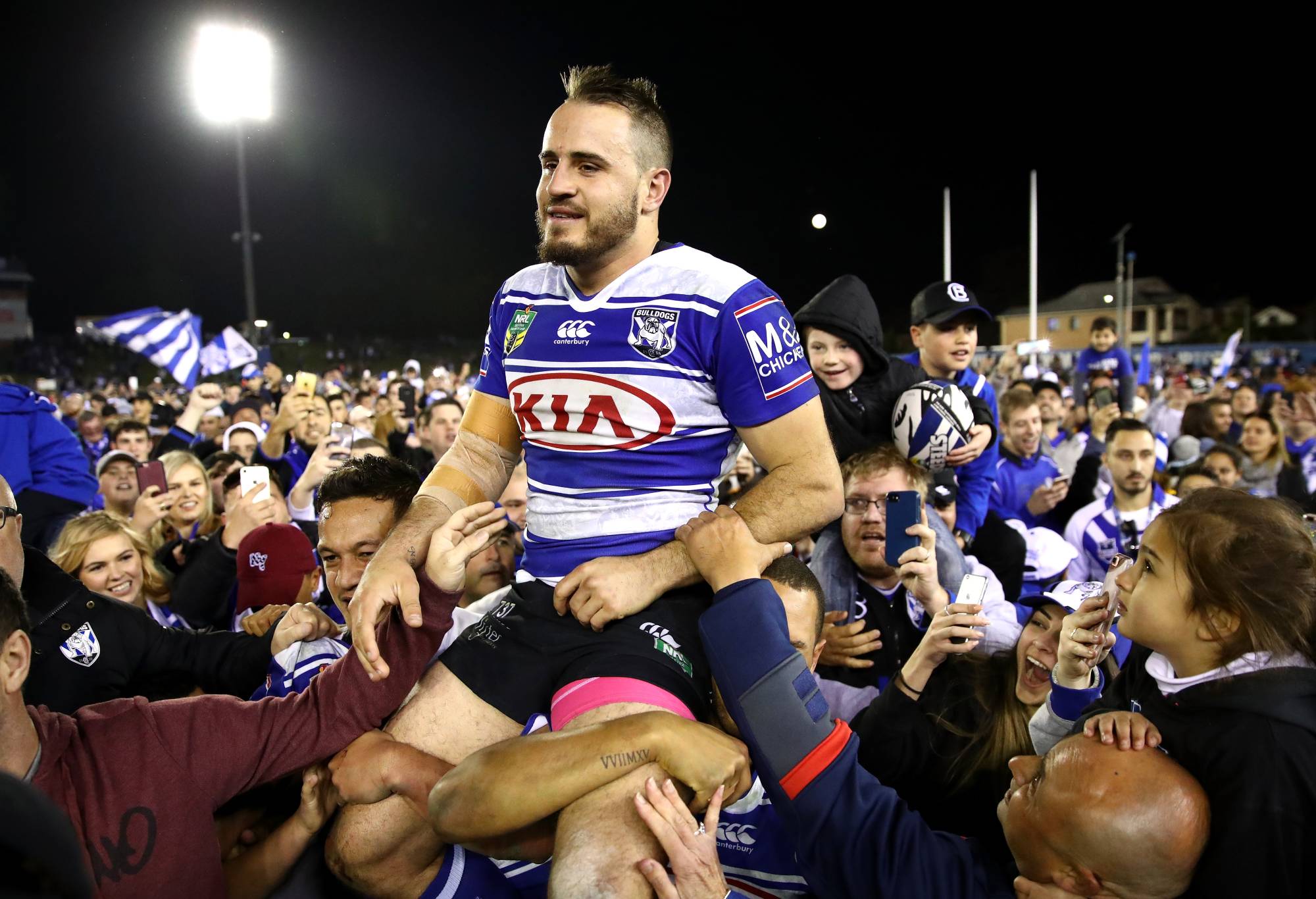 Josh Reynolds of the Bulldogs is chaird off the field after winning the round 18 NRL match between the Canterbury Bulldogs and the Newcastle Knights at Belmore Sports Ground on July 9, 2017 in Sydney, Australia