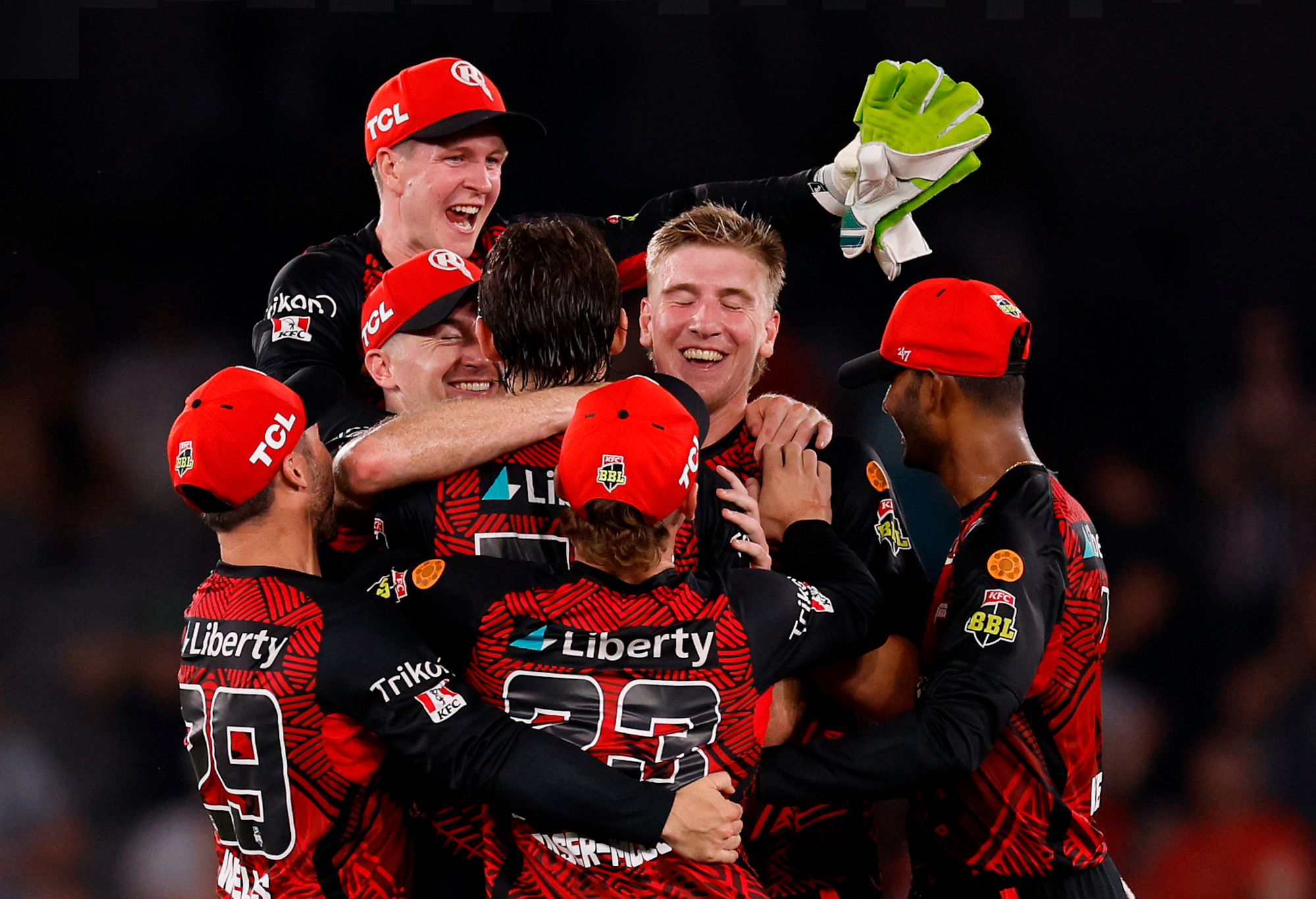 Renegades players celebrate victory.