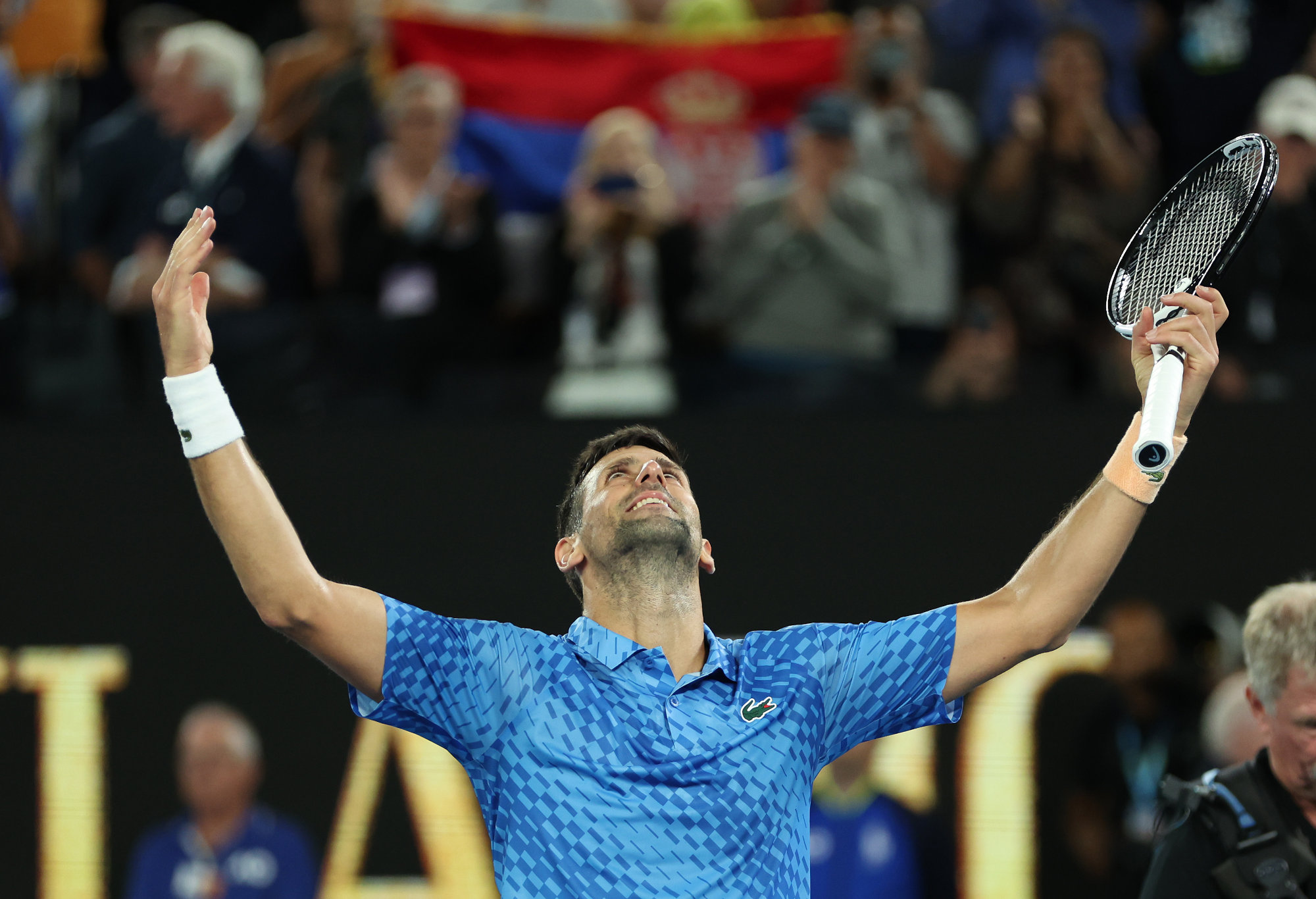 Novak Djokovic melakukan selebrasi.