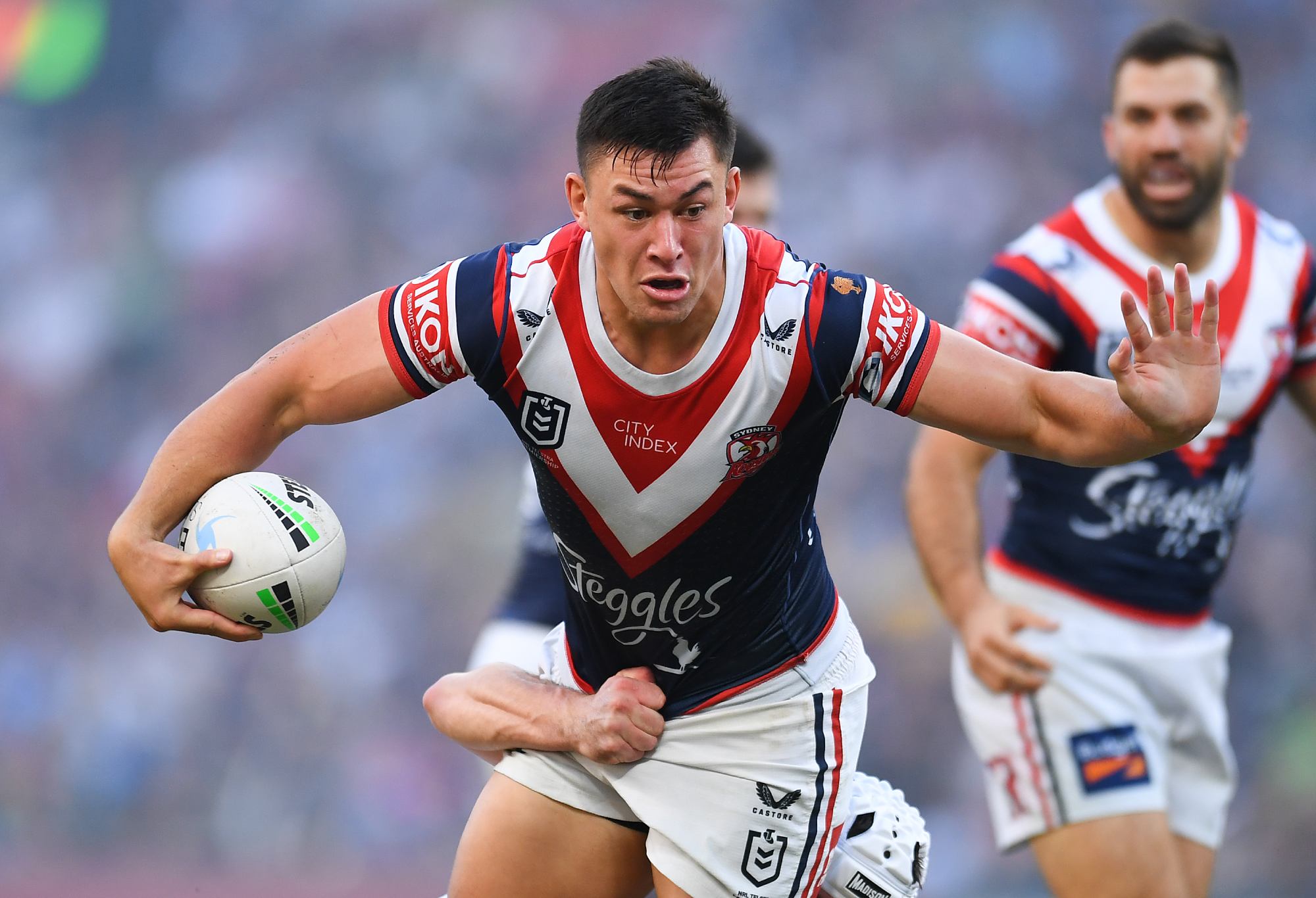 BRISBANE, AUSTRALIA - MAY 15: Joseph Manu of the Roosters is tackled during the round 10 NRL match between the Sydney Roosters and the Parramatta Eels at Suncorp Stadium, on May 15, 2022, in Brisbane, Australia. (Photo by Albert Perez/Getty Images)