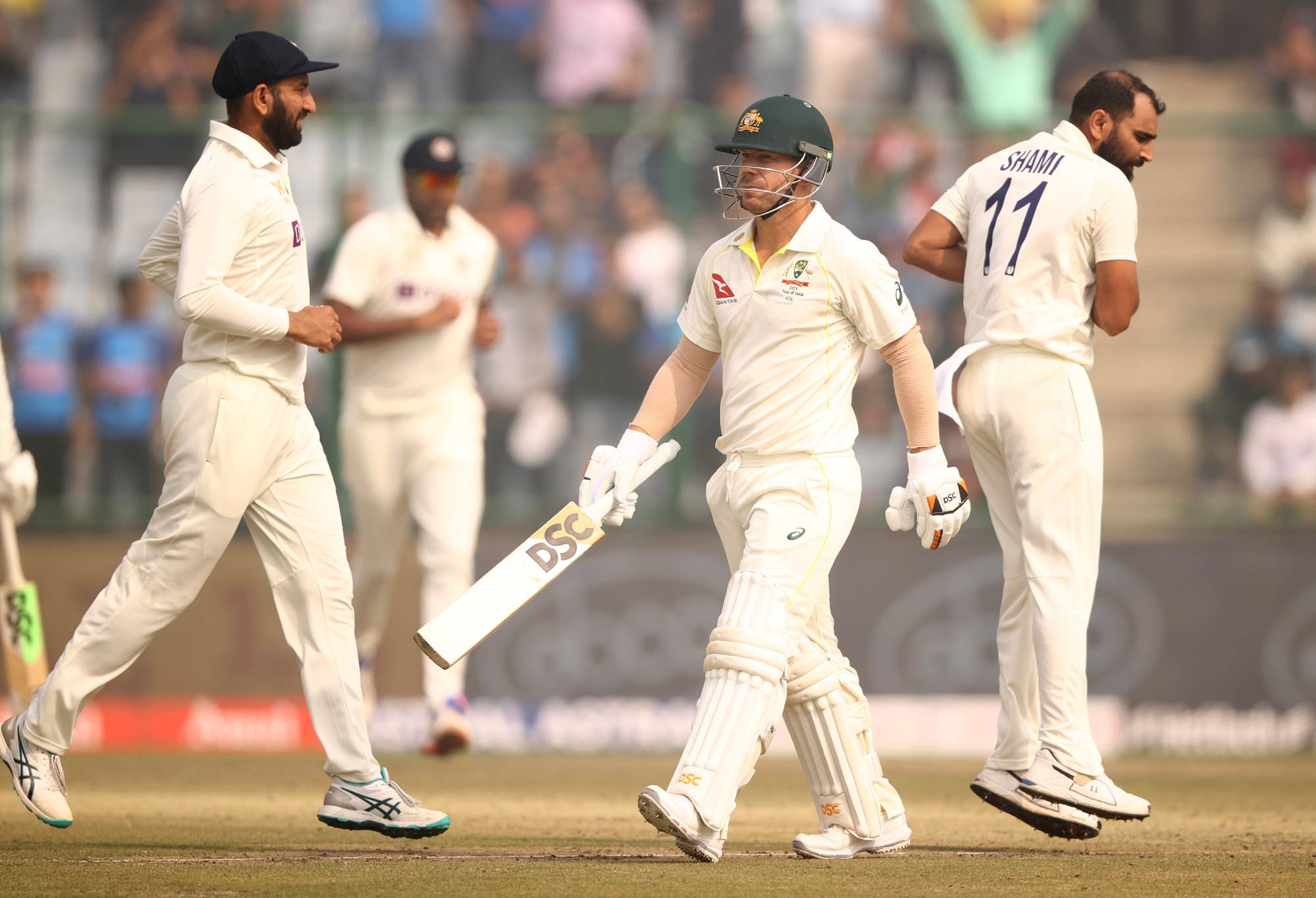 DELHI, INDIA - FEBRUARY 17: David Warner of Australia walks off after he was dismissed by Mohammed Shami of India during day one of the Second Test match in the series between India and Australia at Arun Jaitley Stadium on February 17, 2023 in Delhi, India. (Photo by Robert Cianflone/Getty Images)
