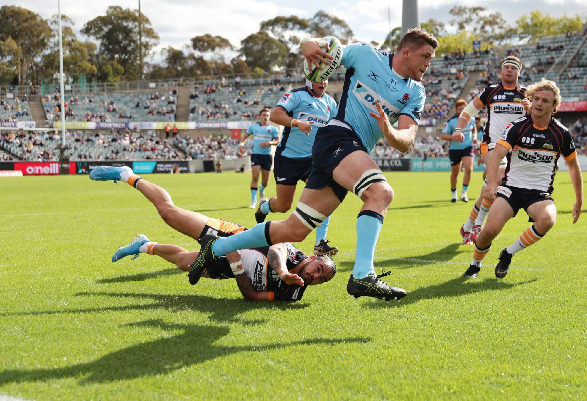 CANBERRA, AUSTRALIA - MARCH 15: Lachie Swinton of the Waratahs Is tackled by Andy Muirhead of the Brumbies during the round seven Super Rugby match between the Brumbies and the Waratahs at GIO Stadium on March 15, 2020 in Canberra, Australia. (Photo by Mark Metcalfe/Getty Images)