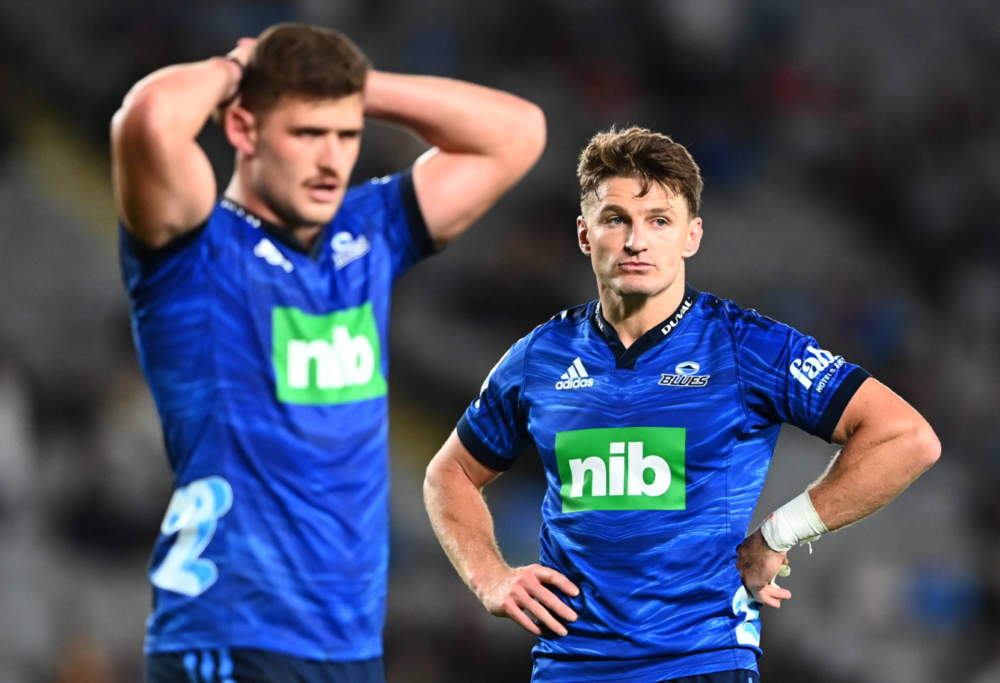 Dalton Papalii and Beauden Barrett of the Blues