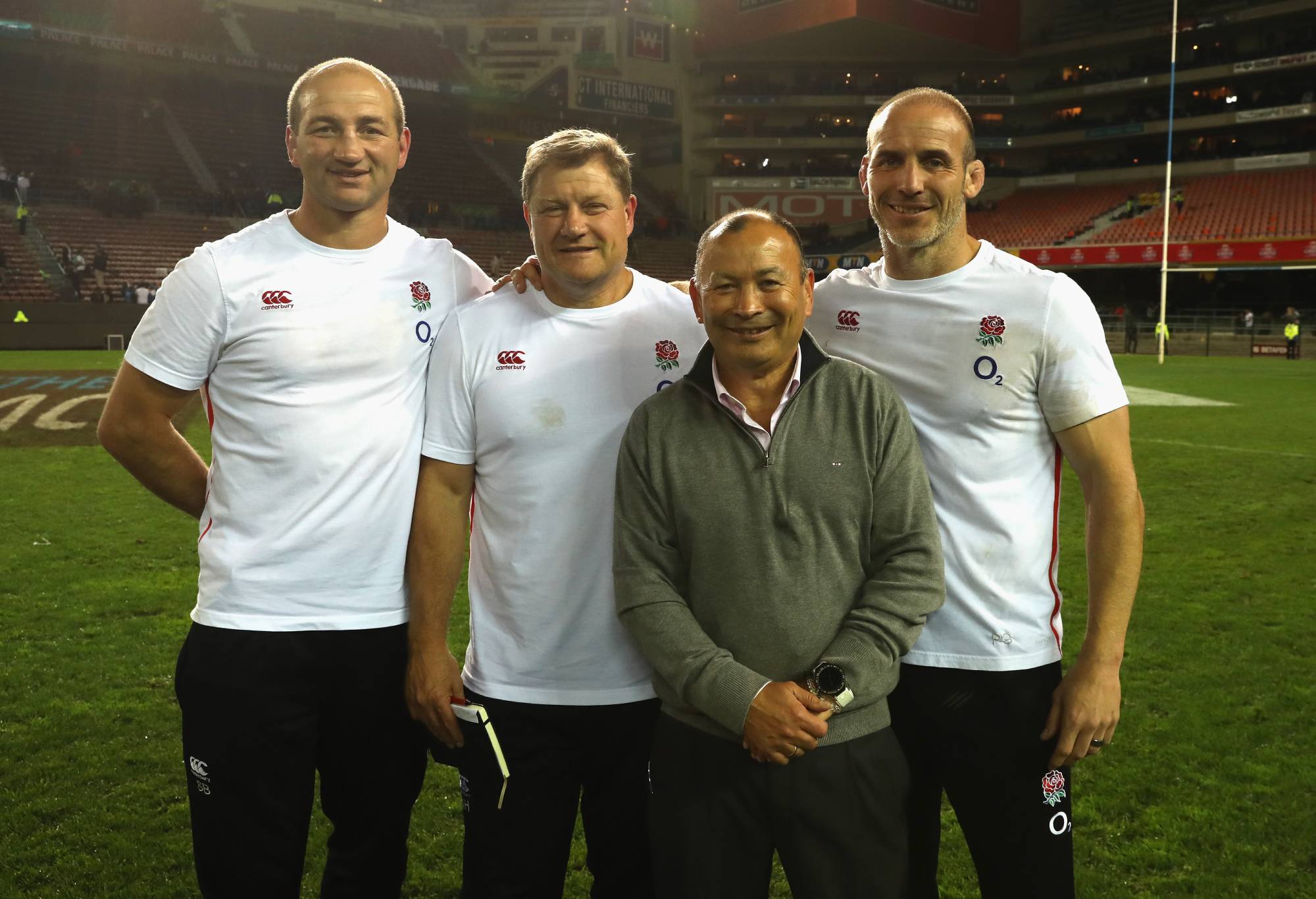 The England coaches, Steve Borthwick, forwards coach, Neal Hatley, the scrum coach, head coach Eddie Jones and Paul Gustard, the defence caoch pose after their victory during the third test match between South Africa and England at Newlands Stadium on June 23, 2018 in Cape Town, South Africa. (Photo by David Rogers/Getty Images)