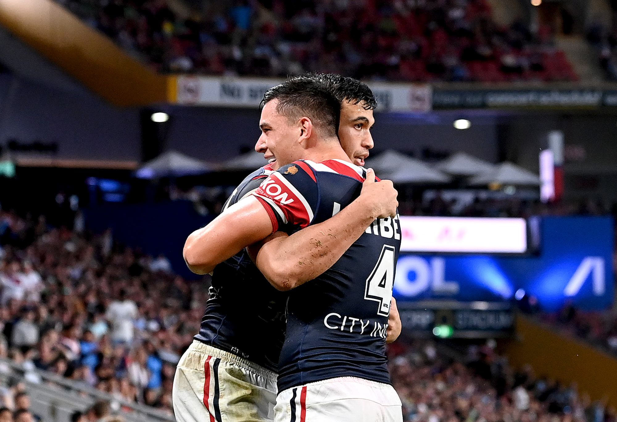 BRISBANE, AUSTRALIA - MAY 15: Joseph Suaalii of the Roosters celebrates with team mate Joseph Manu after scoring a try during the NRL Round 10 match between the Sydney Roosters and the Parramatta Eels at Suncorp Stadium on May 15, 2022 in Brisbane, Australia.  (Photo by Bradley Kanaris/Getty Images)