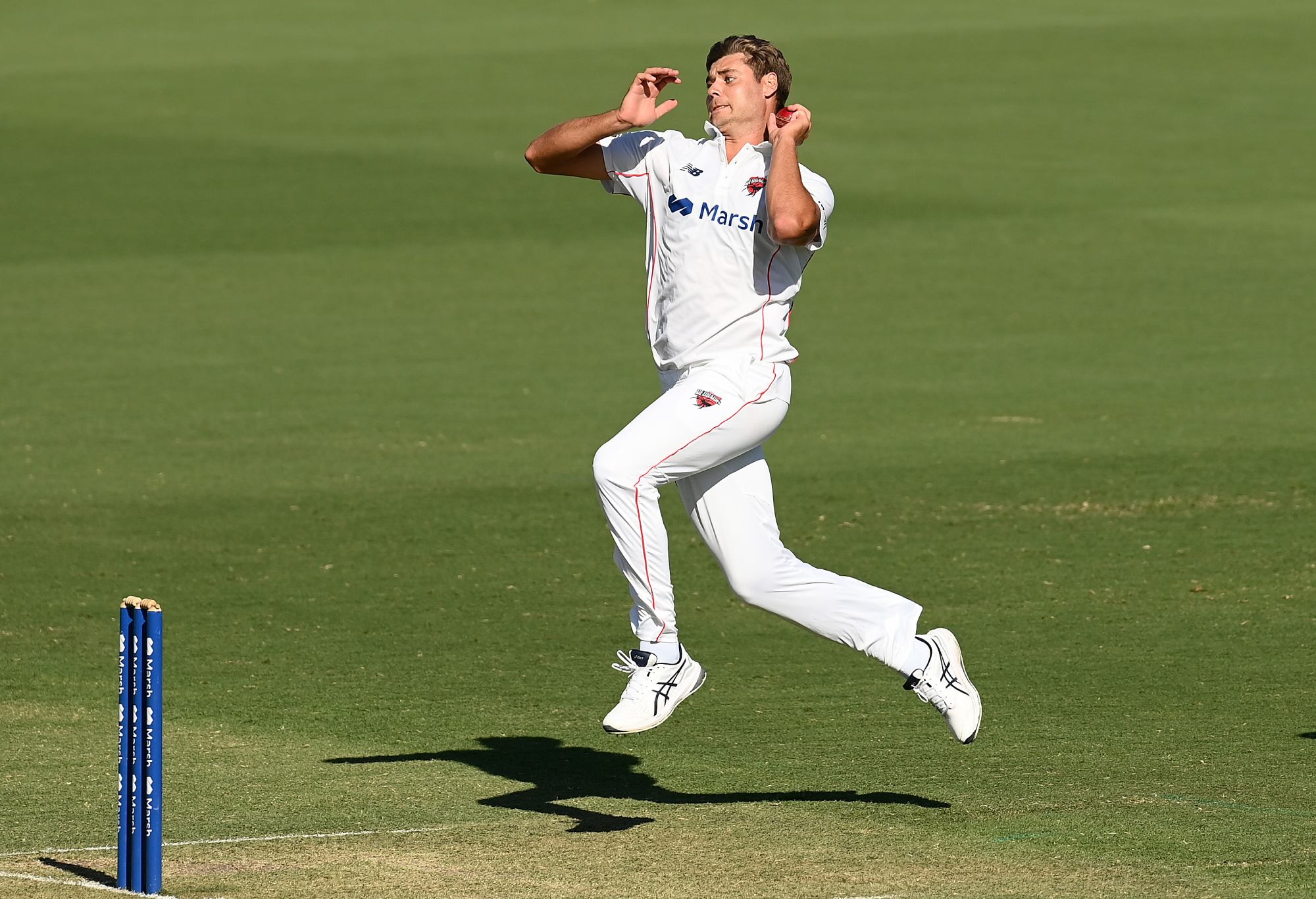 MELBOURNE, AUSTRALIA - FEBRUARY 21: Spencer Johnson of South Australia bowls during the Sheffield Shield match between Victoria and South Australia at CitiPower Centre, on February 21, 2023, in Melbourne, Australia. (Photo by Quinn Rooney/Getty Images)