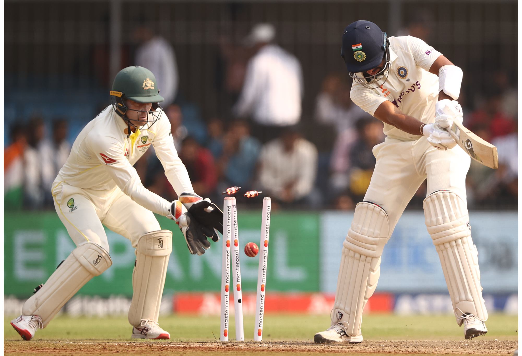 INDORE, INDIA - MARCH 01: Cheteshwar Pujara of India is bowled by Nathan Lyon of Australia during day one of the Third Test match in the series between India and Australia at Holkare Cricket Stadium on March 01, 2023 in Indore, India. (Photo by Robert Cianflone/Getty Images)